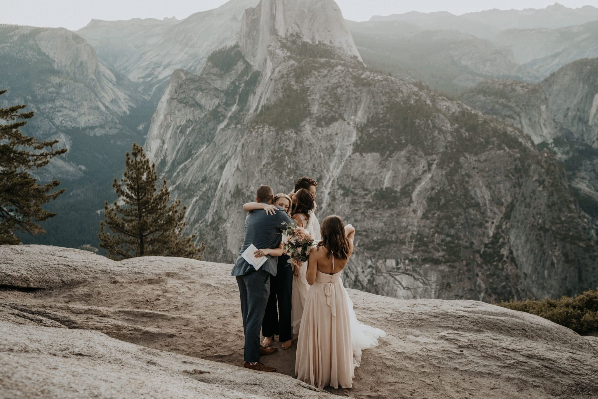 Yosemite National Park elopement and wedding photos at Glacier Point during sunrise with view of Half Dome