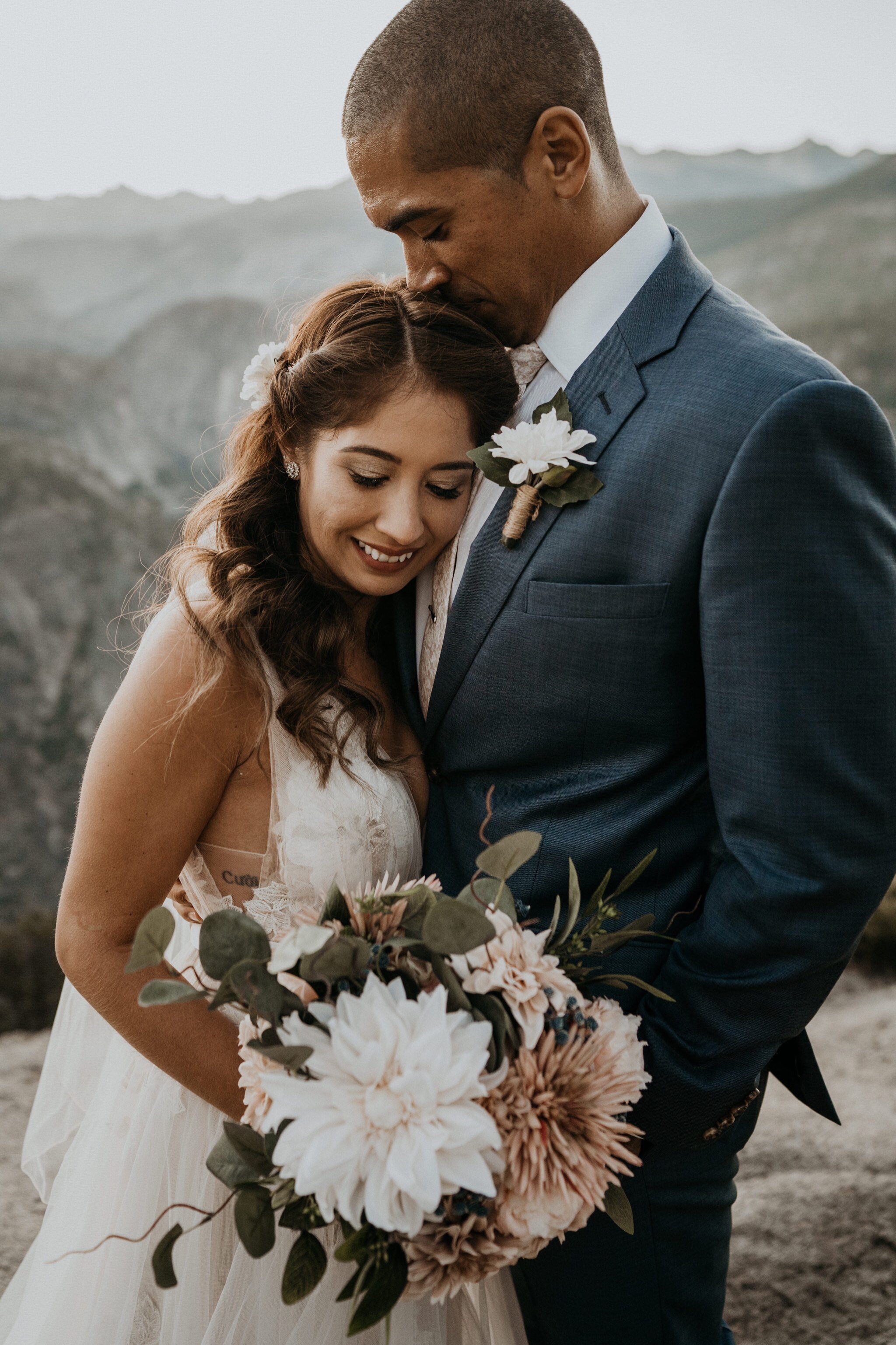 Yosemite National Park elopement and wedding photos at Glacier Point during sunrise with view of Half Dome