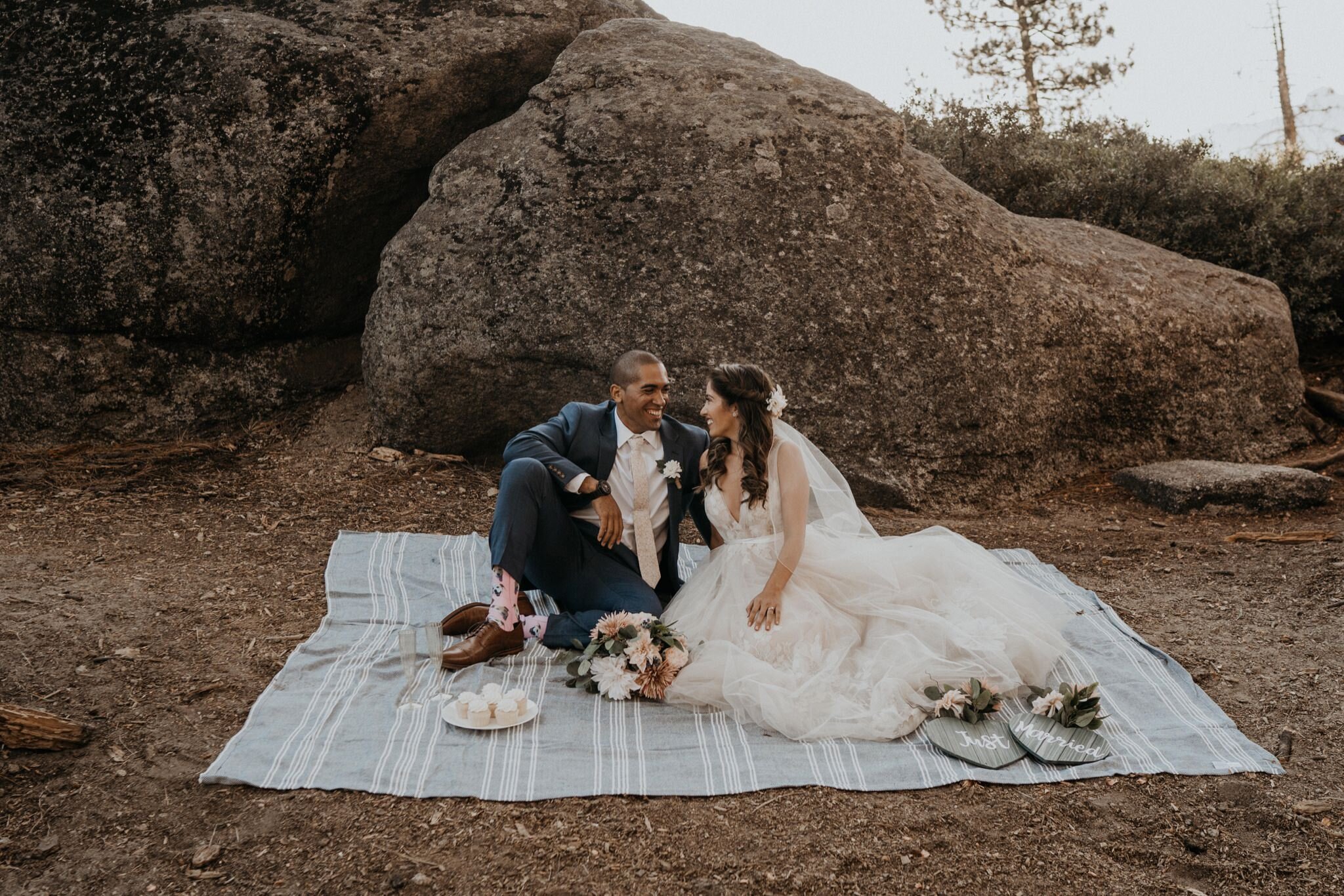 Cute picnic for wedding at Yosemite National Park elopement and wedding photos at Glacier Point during sunrise with view of Half Dome