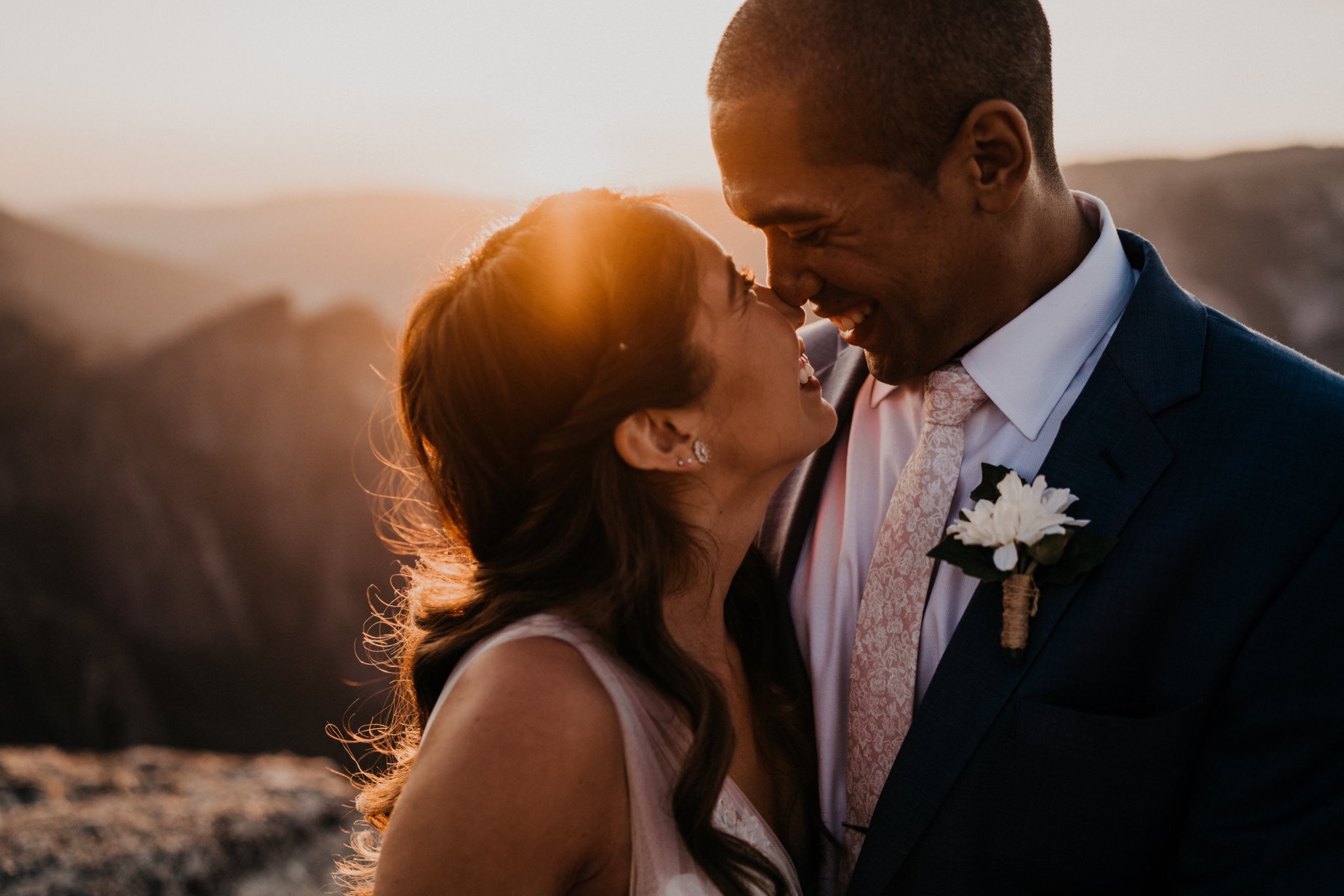 Beautiful sunset photos at Taft Point on their elopement day at Yosemite National Park