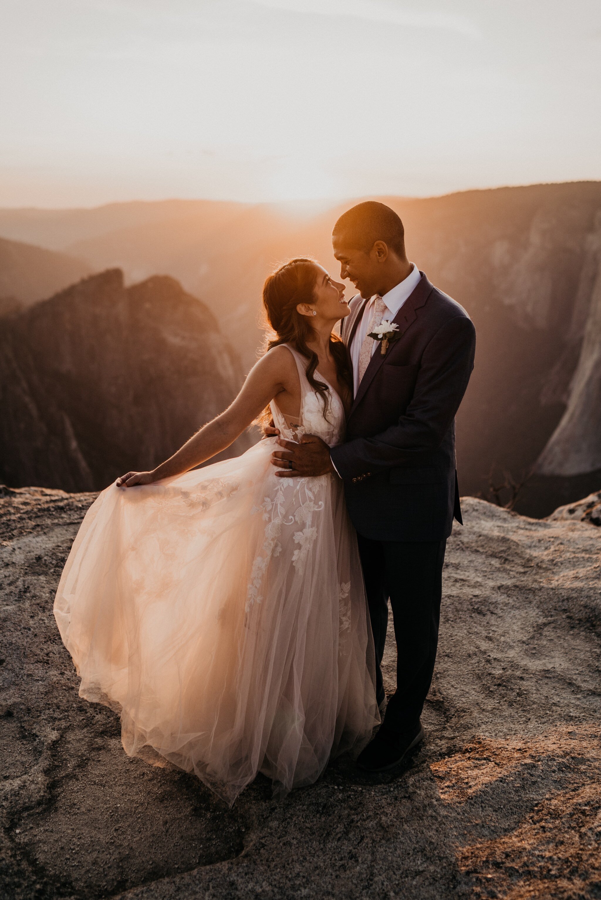 Beautiful sunset photos at Taft Point on their elopement day at Yosemite National Park