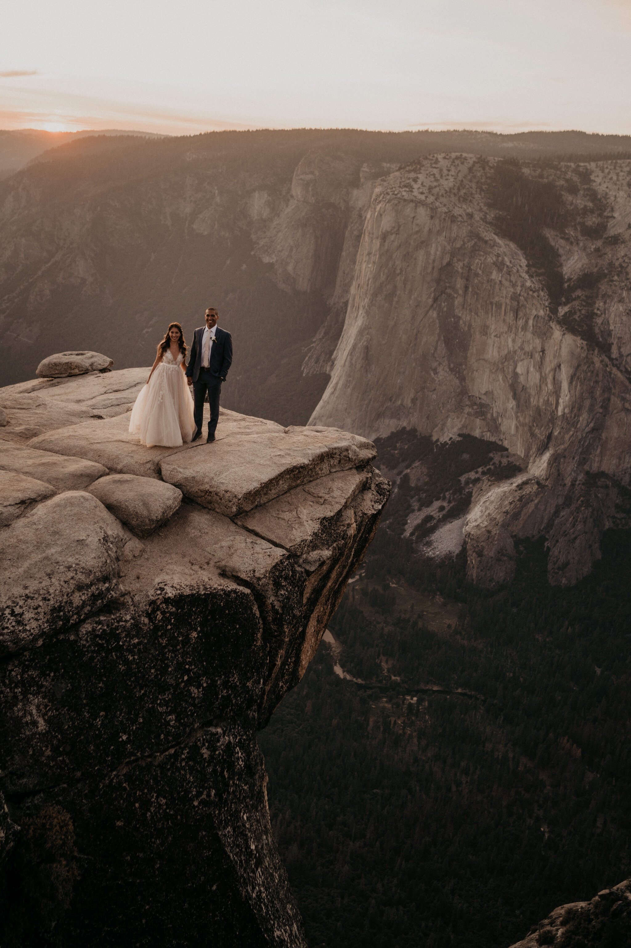 Beautiful sunset photos at Taft Point on their elopement day at Yosemite National Park