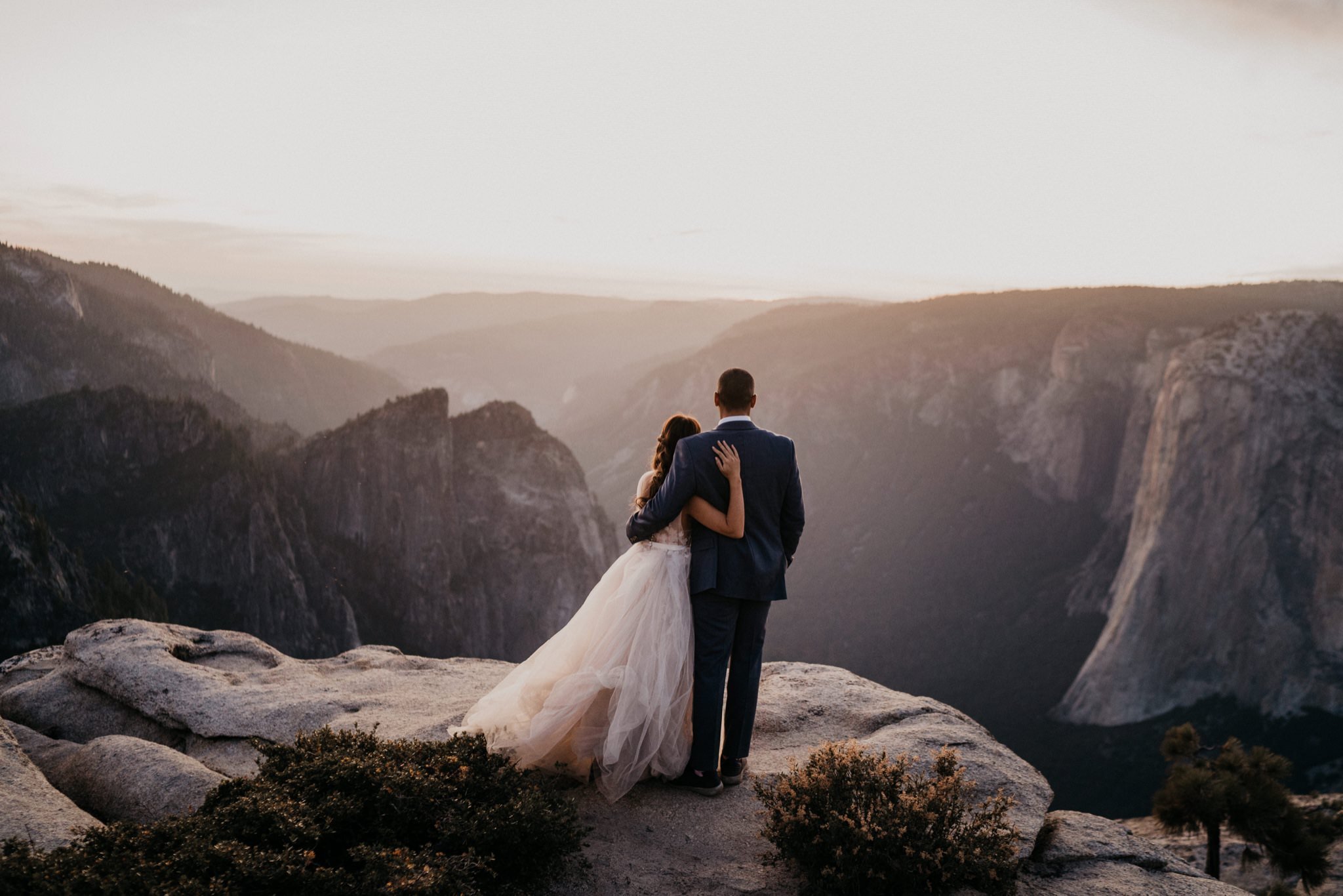 Beautiful sunset photos at Taft Point on their elopement day at Yosemite National Park