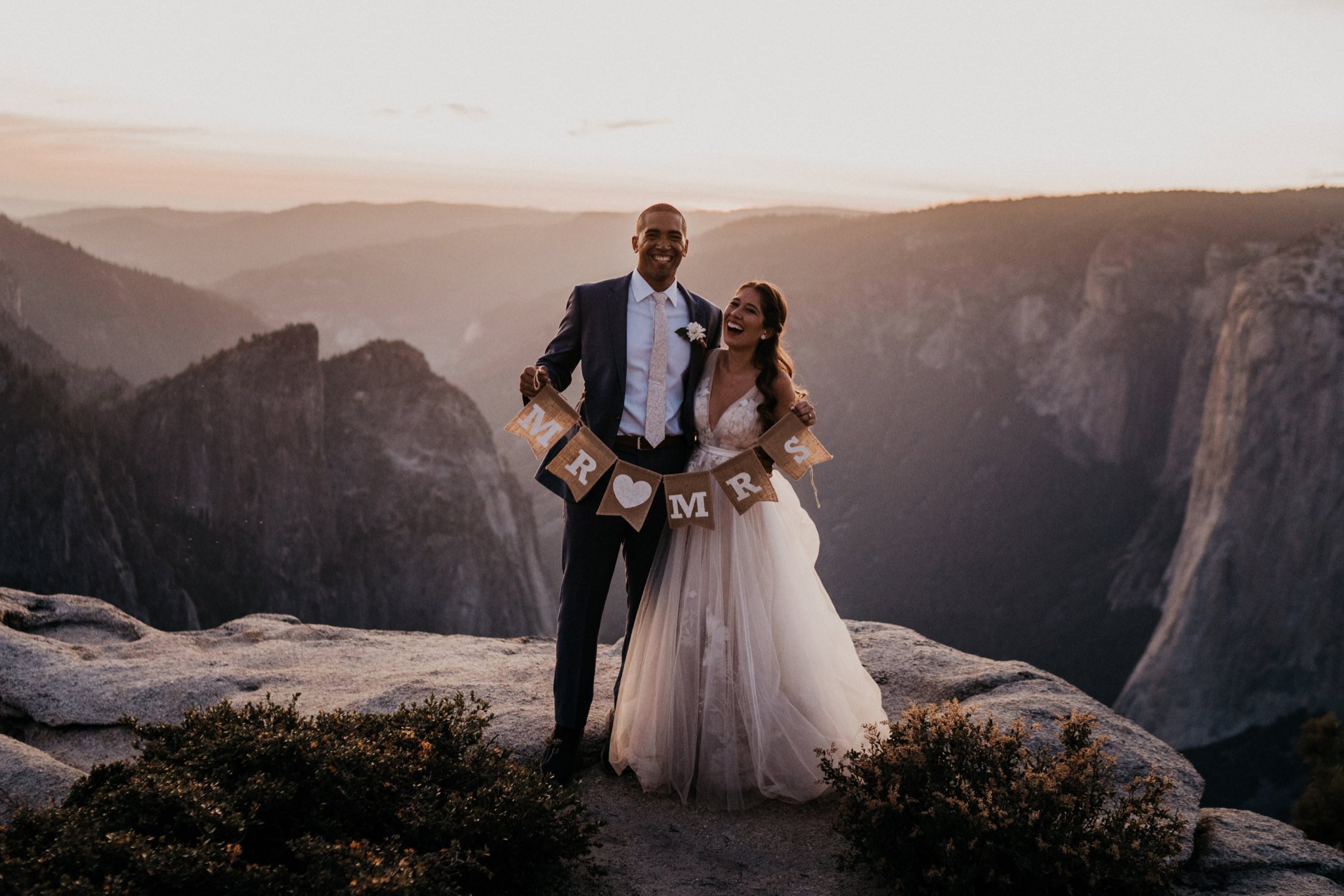 Beautiful sunset photos at Taft Point on their elopement day at Yosemite National Park