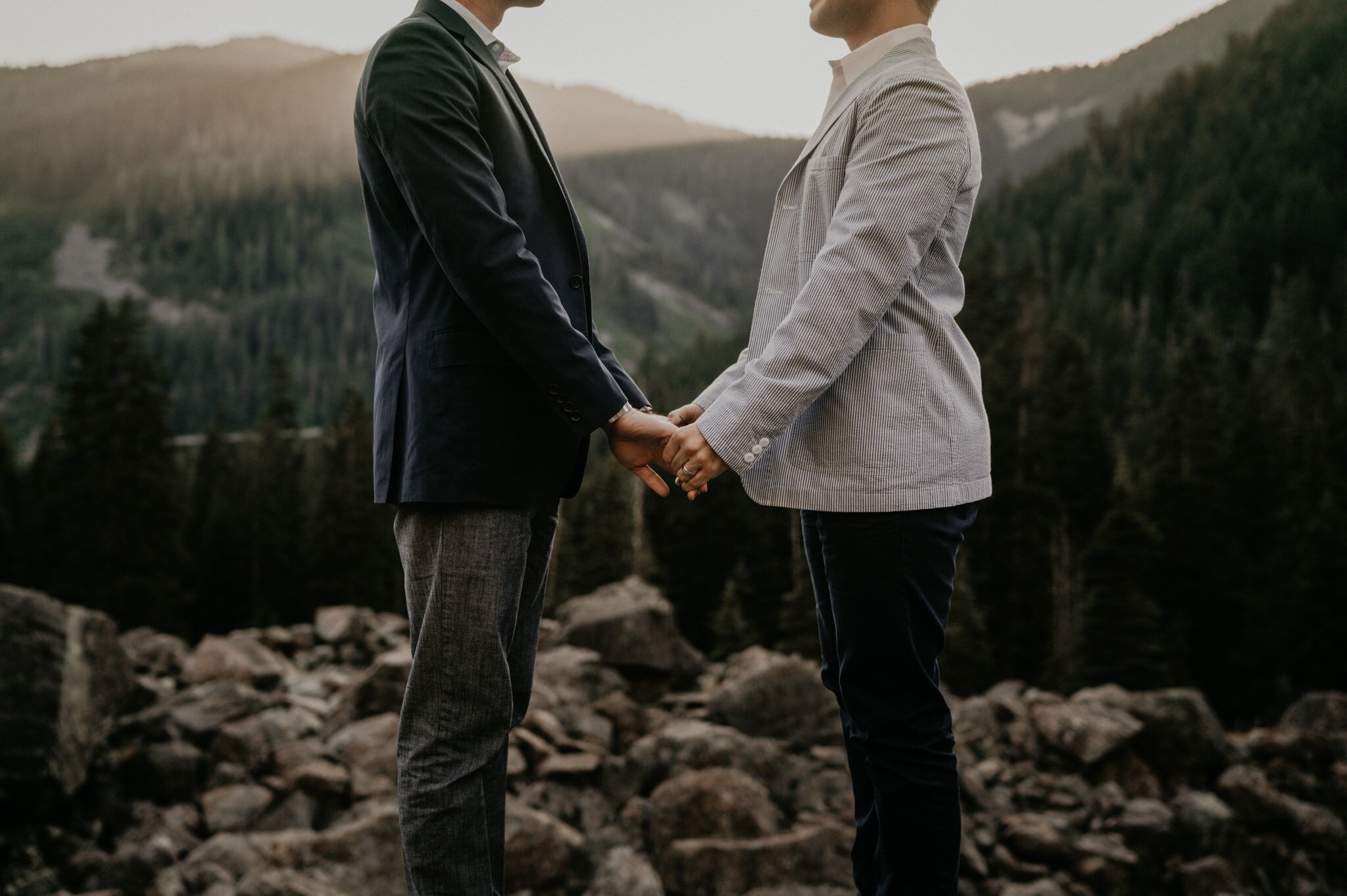 Snoqualmie Pass engagement photos with Mountain and Waterfall views Seattle LGBTQ wedding photographer