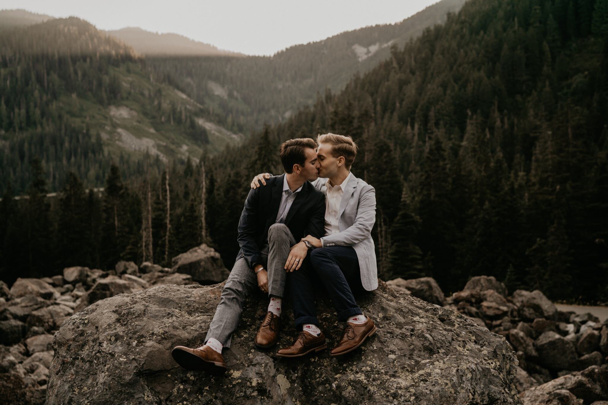 Snoqualmie Pass engagement photos with Mountain and Waterfall views Seattle LGBTQ wedding photographer