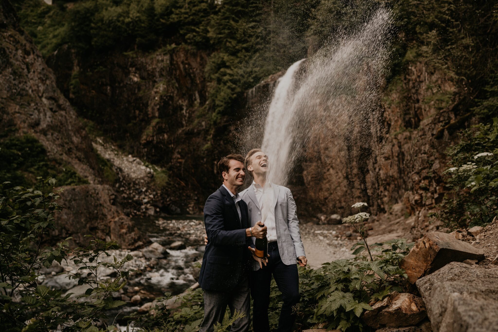 Snoqualmie Pass engagement photos with Mountain and Waterfall views Seattle LGBTQ wedding photographer