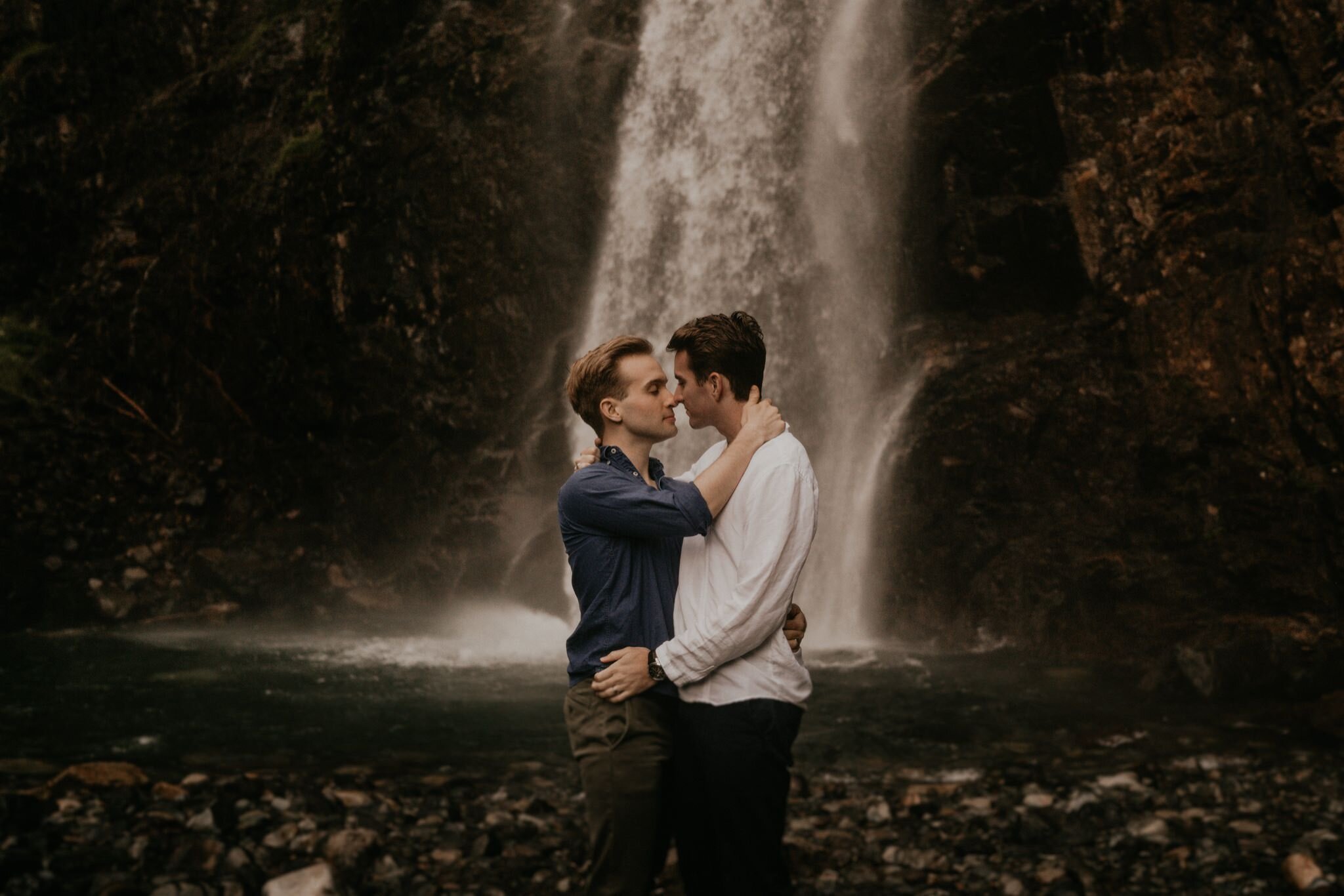 Snoqualmie Pass engagement photos with Mountain and Waterfall views Seattle LGBTQ wedding photographer