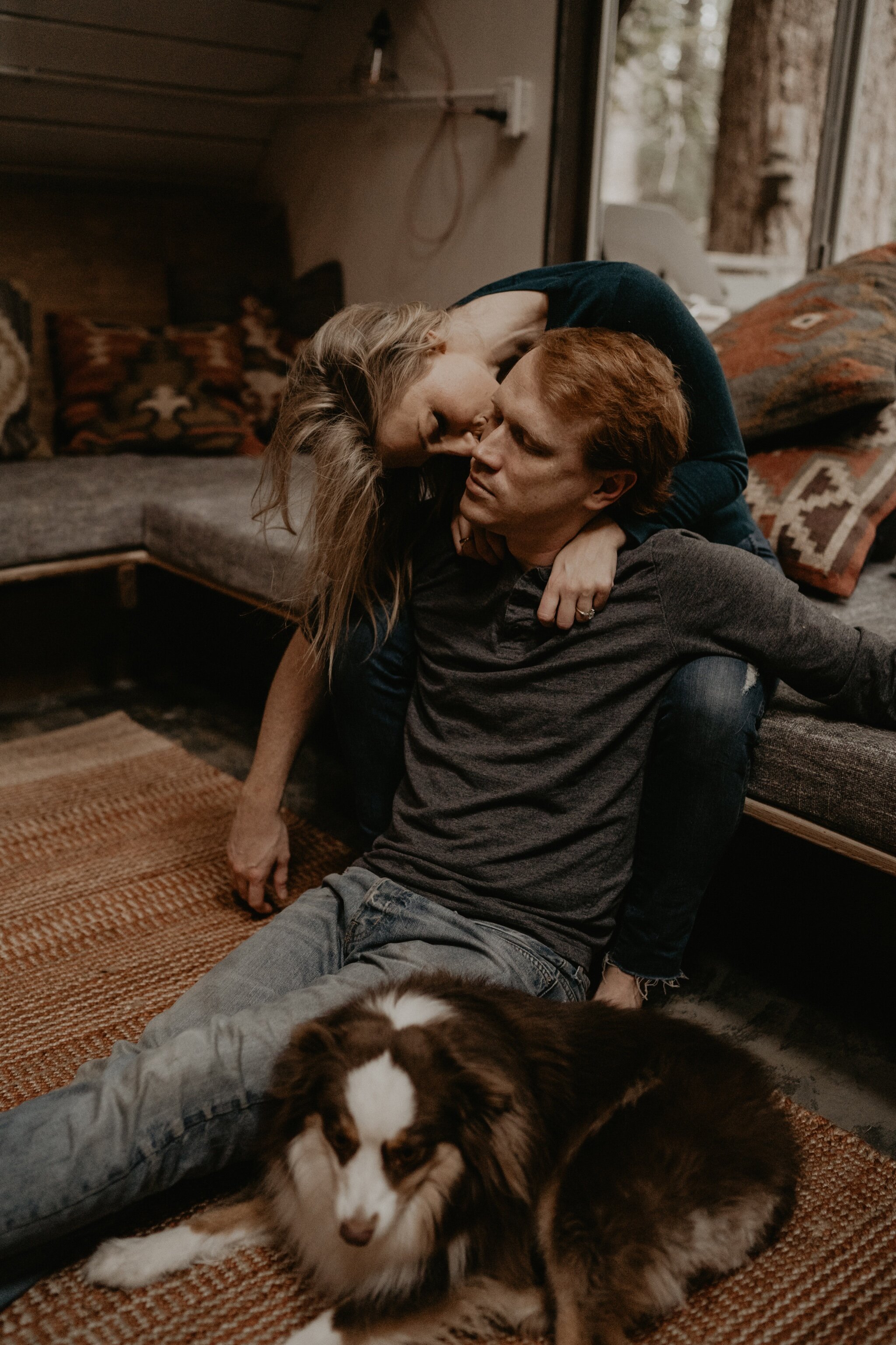 Couple stay in a hot tub for their Intimate steamy in-home engagement session at an A-Frame Cabin in Mount Rainier National Park