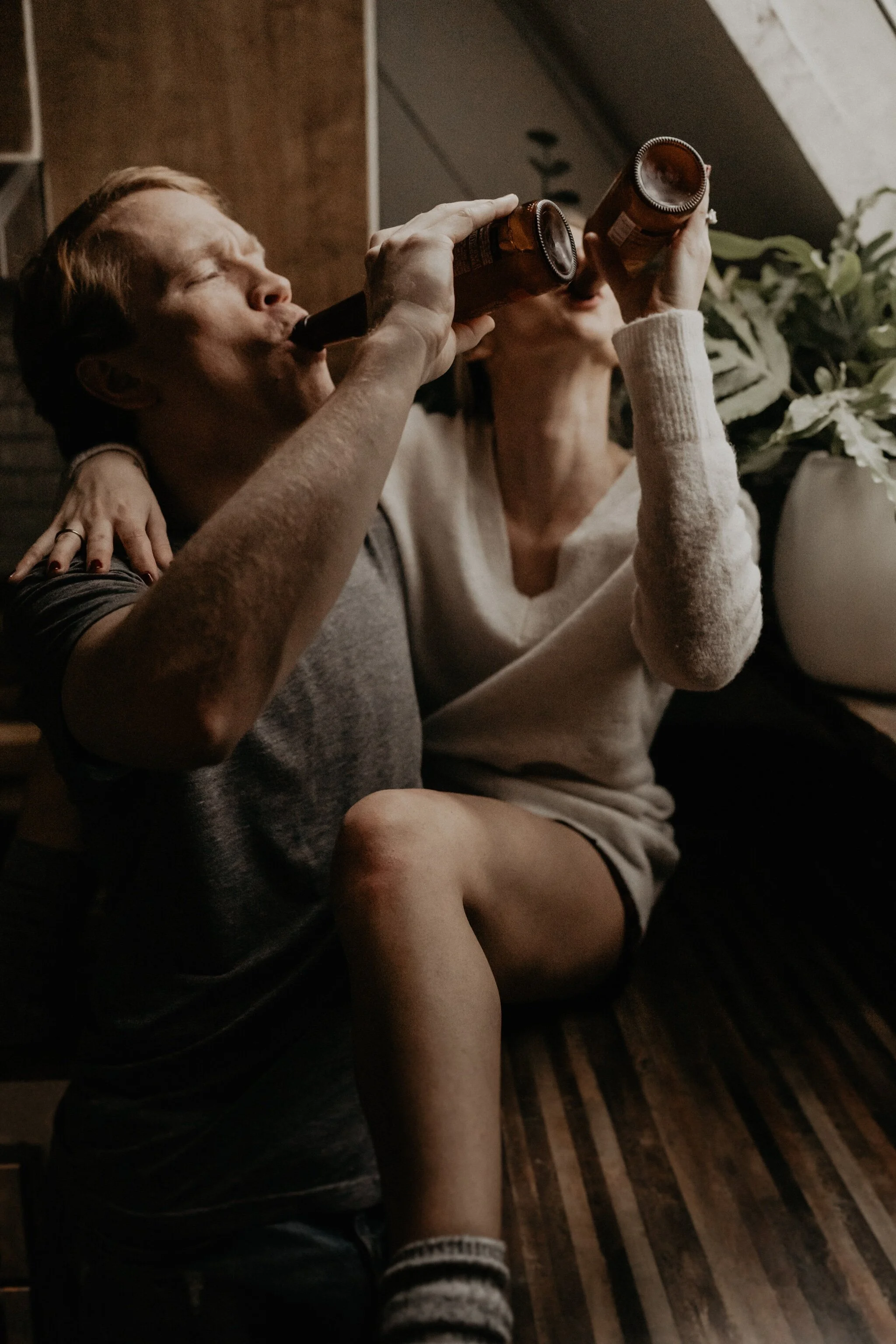 Couple stay in a hot tub for their Intimate steamy in-home engagement session at an A-Frame Cabin in Mount Rainier National Park