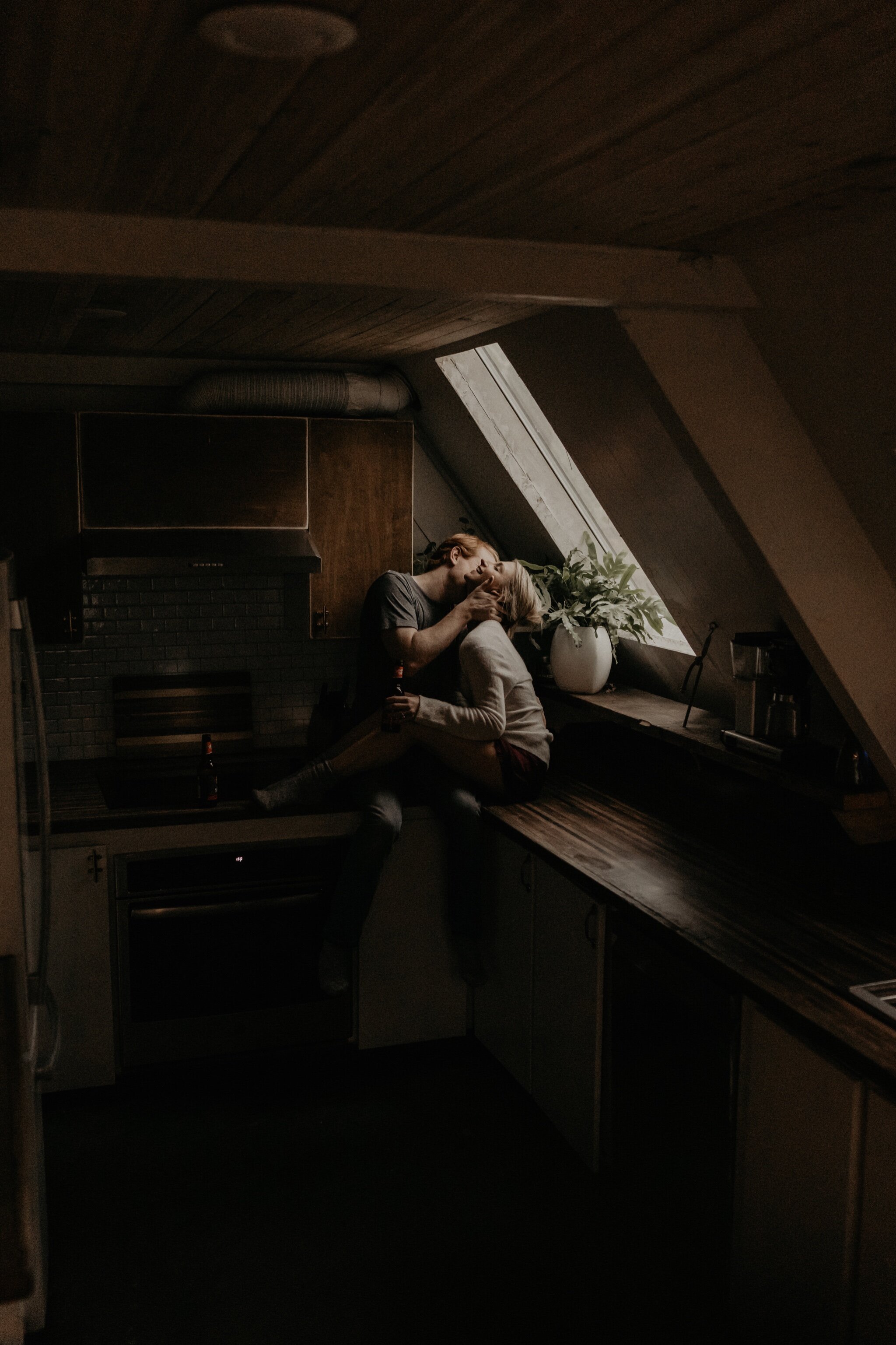 Couple stay in a hot tub for their Intimate steamy in-home engagement session at an A-Frame Cabin in Mount Rainier National Park