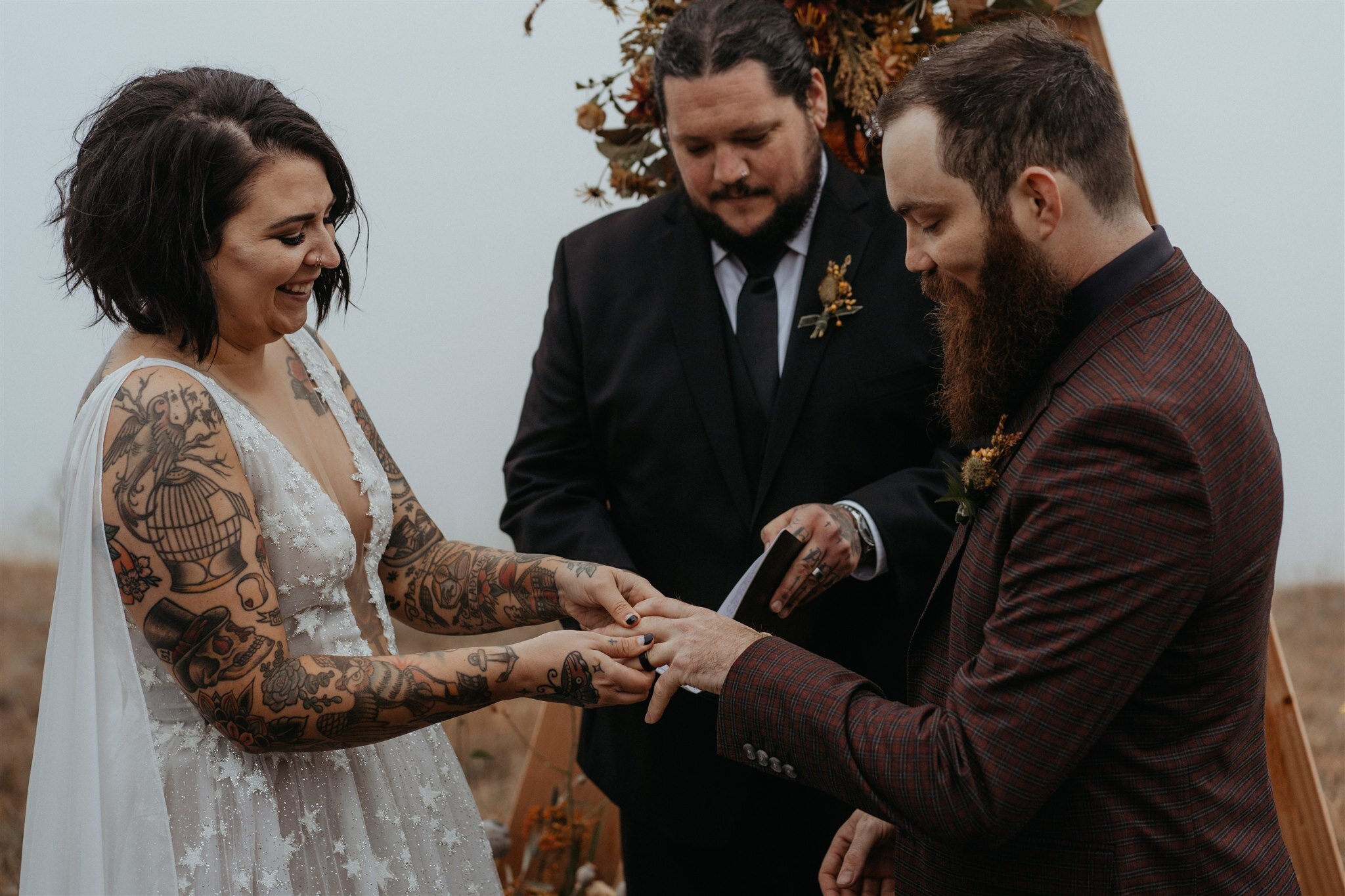 Couple Exchanging Rings on top of mountain at Olympic National Park