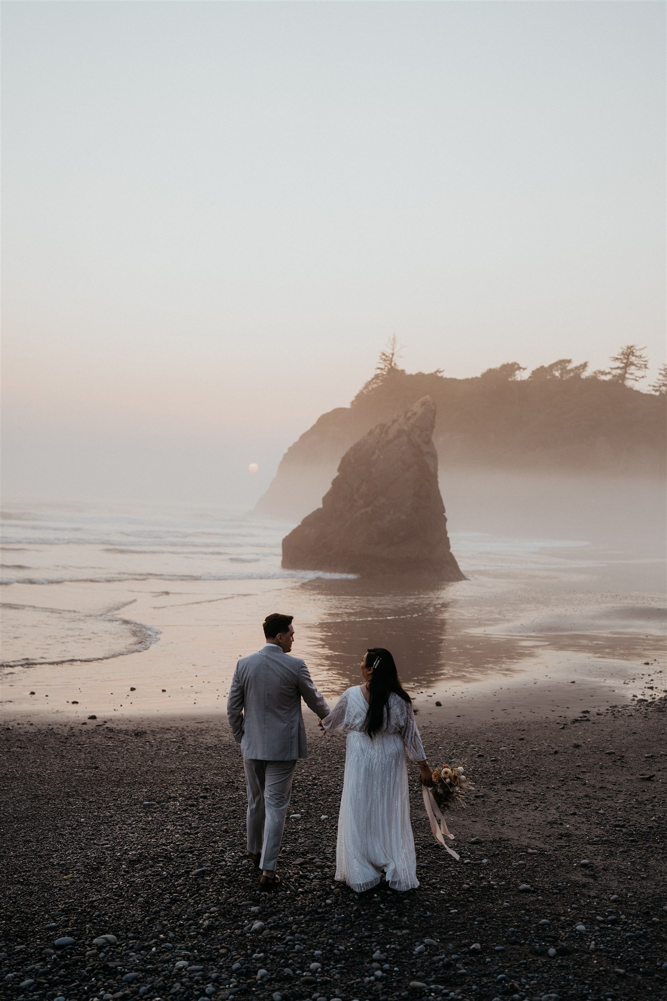 Sunset couple portraits in Ruby Beach Washington