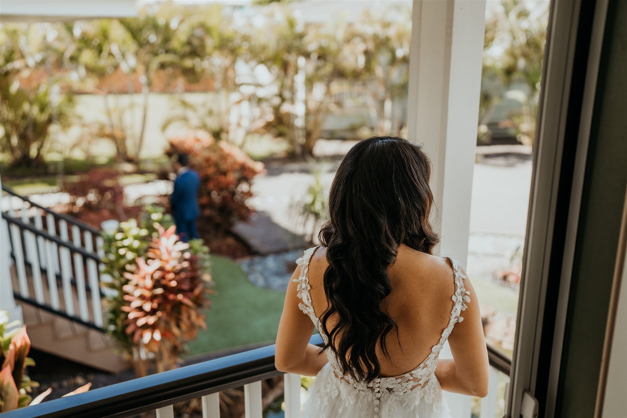 Bride walking outside to meet groom for first look