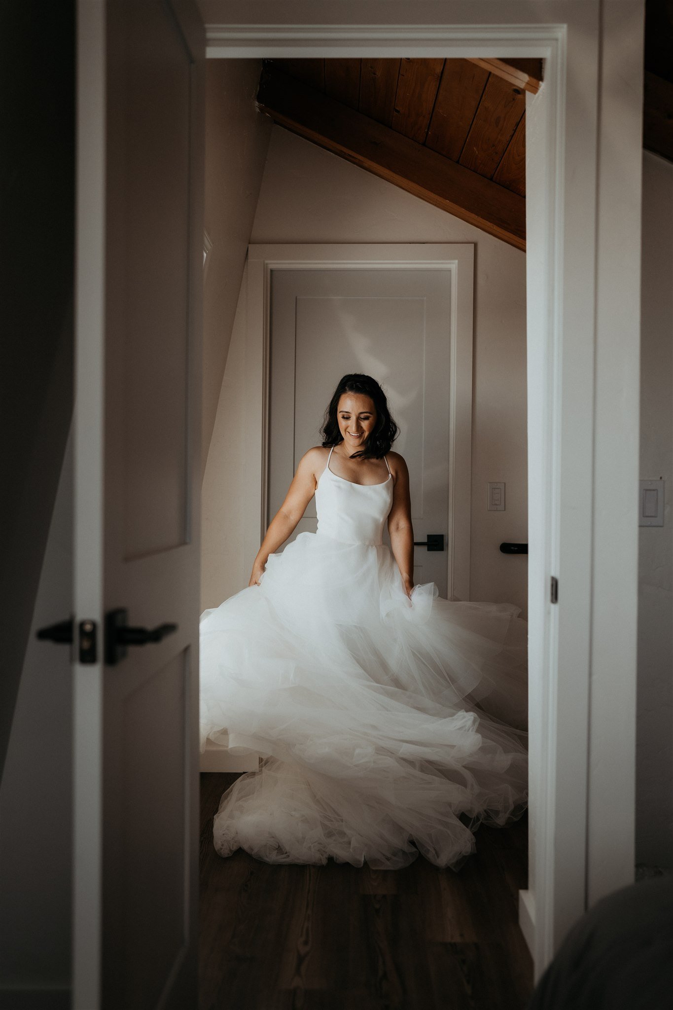 Bride wearing wedding dress and twirling