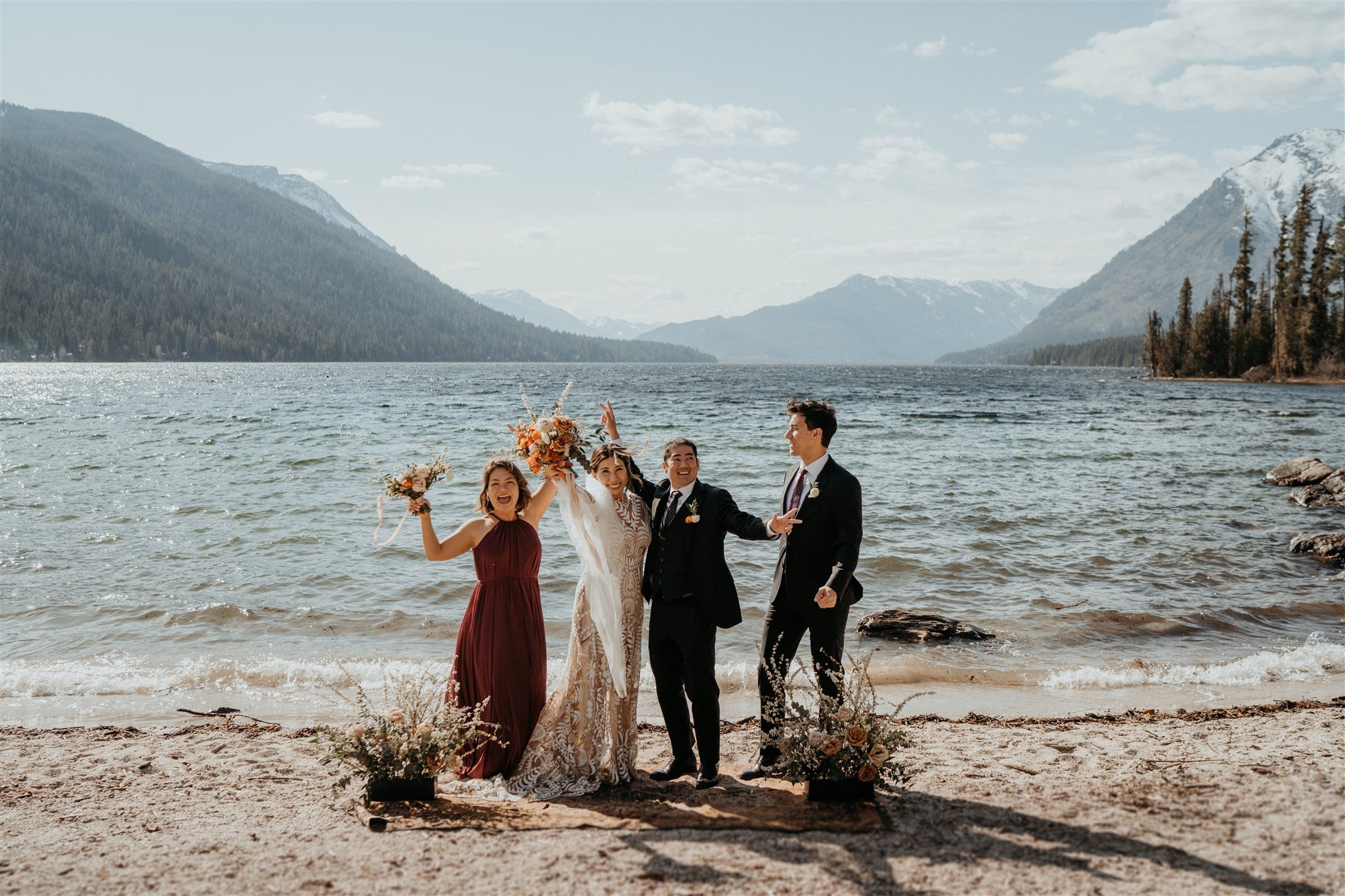 Bride and groom celebrate their Lake Wenatchee elopement with two friends