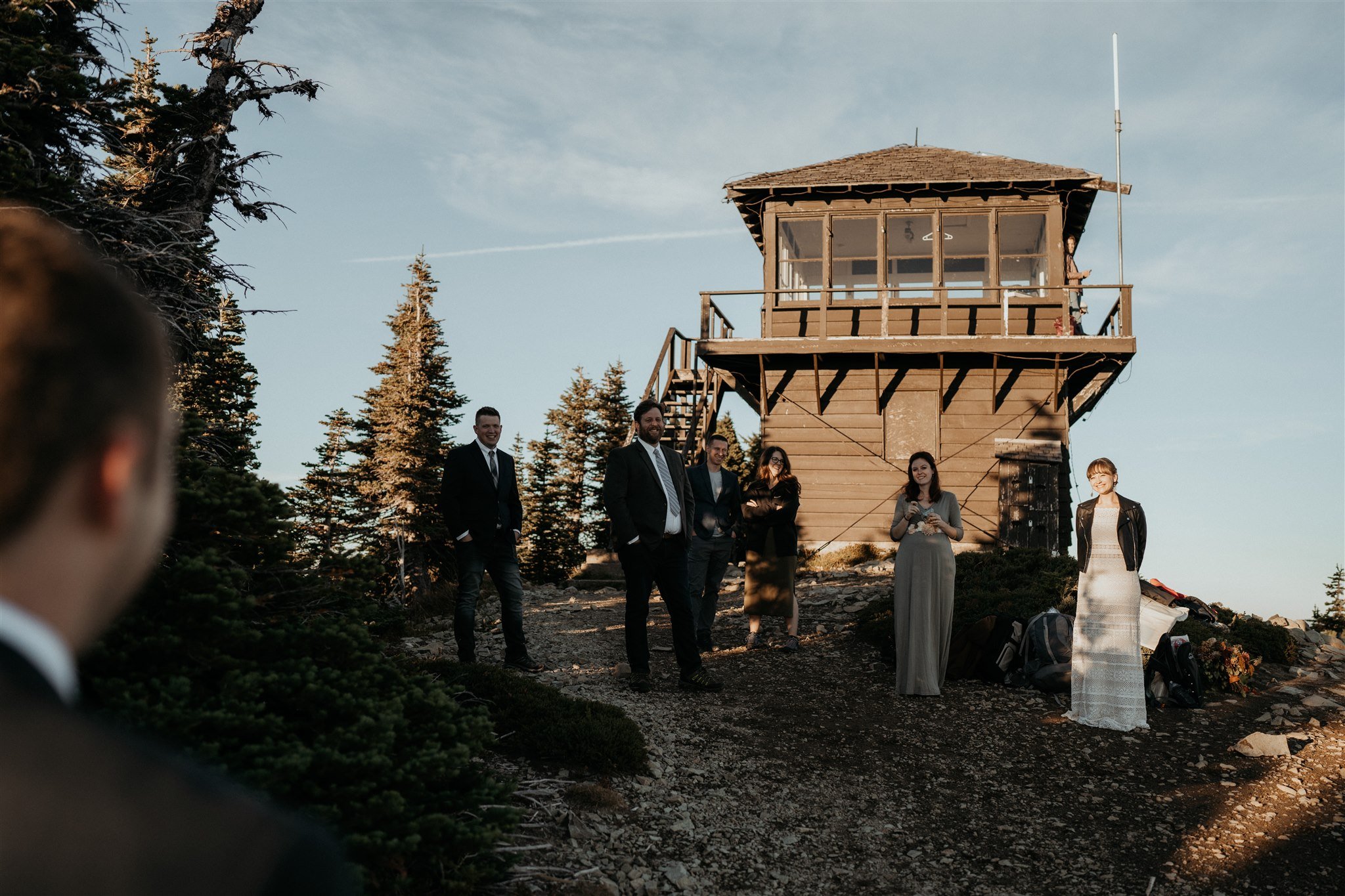 Groom looking towards fire lookout at Mt Rainier National Park