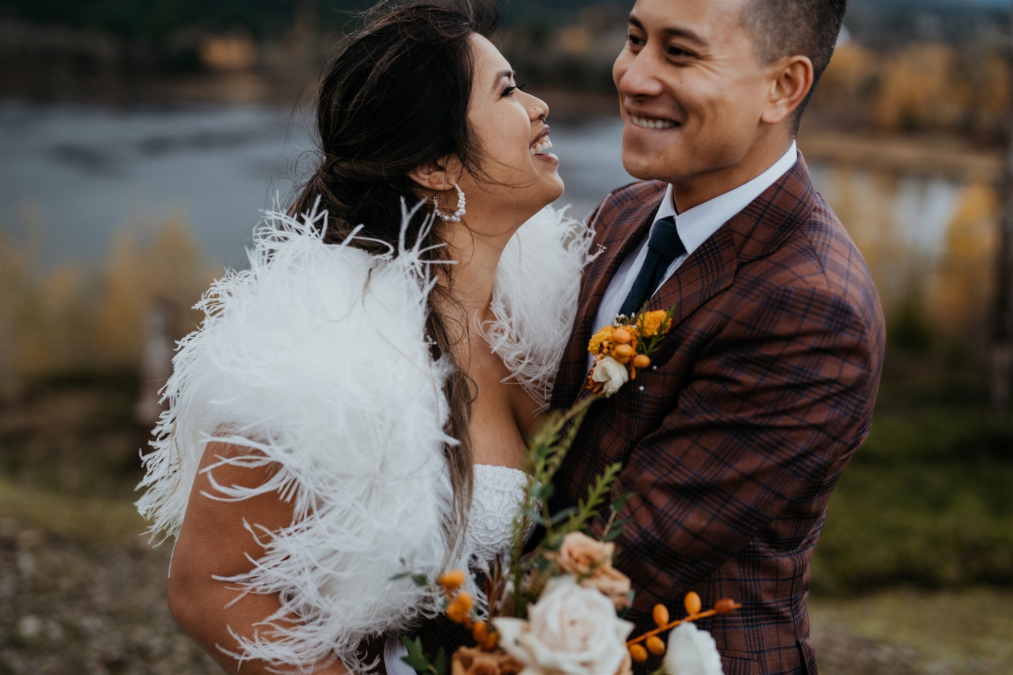 Bride and groom laugh during wedding portraits at Oregon elopement