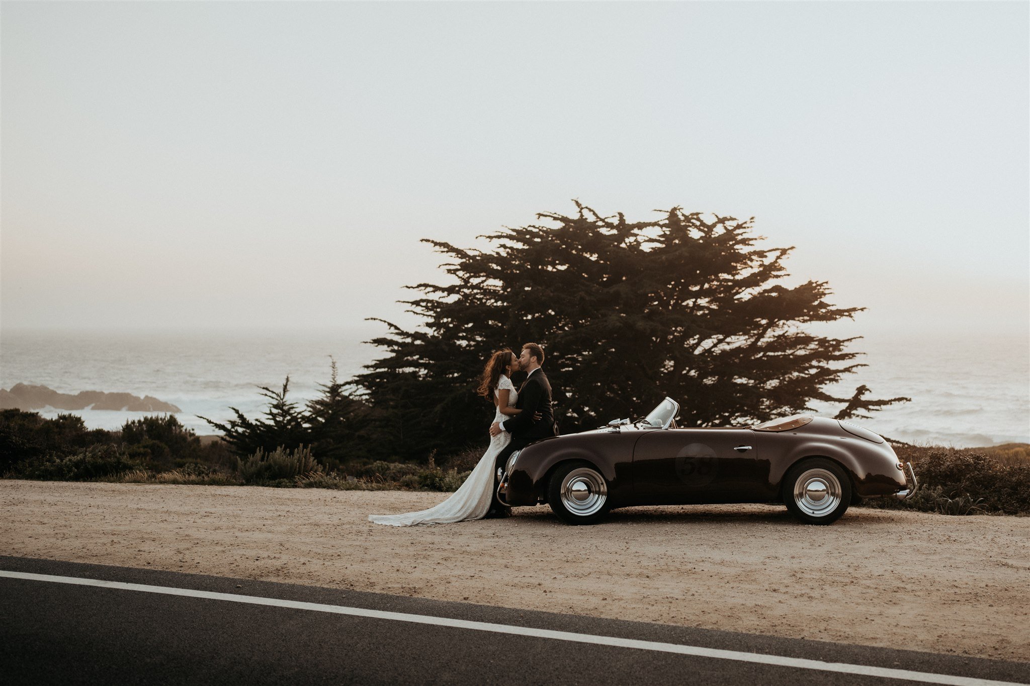 Bride and groom kiss at Big Sur elopement