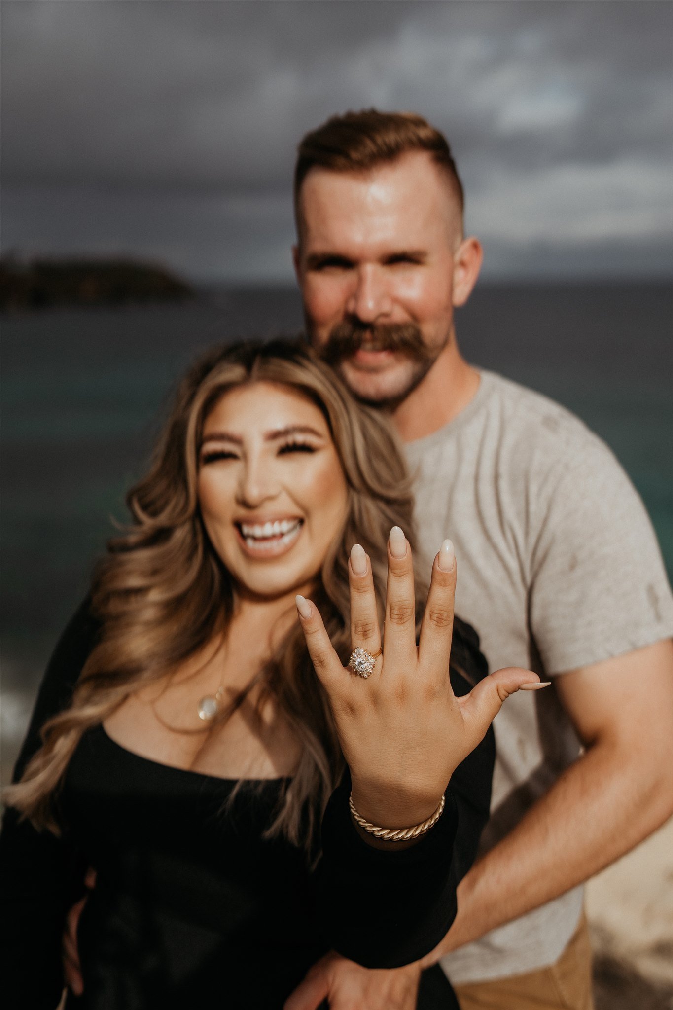Couple photos after surprise proposal in Hawaii