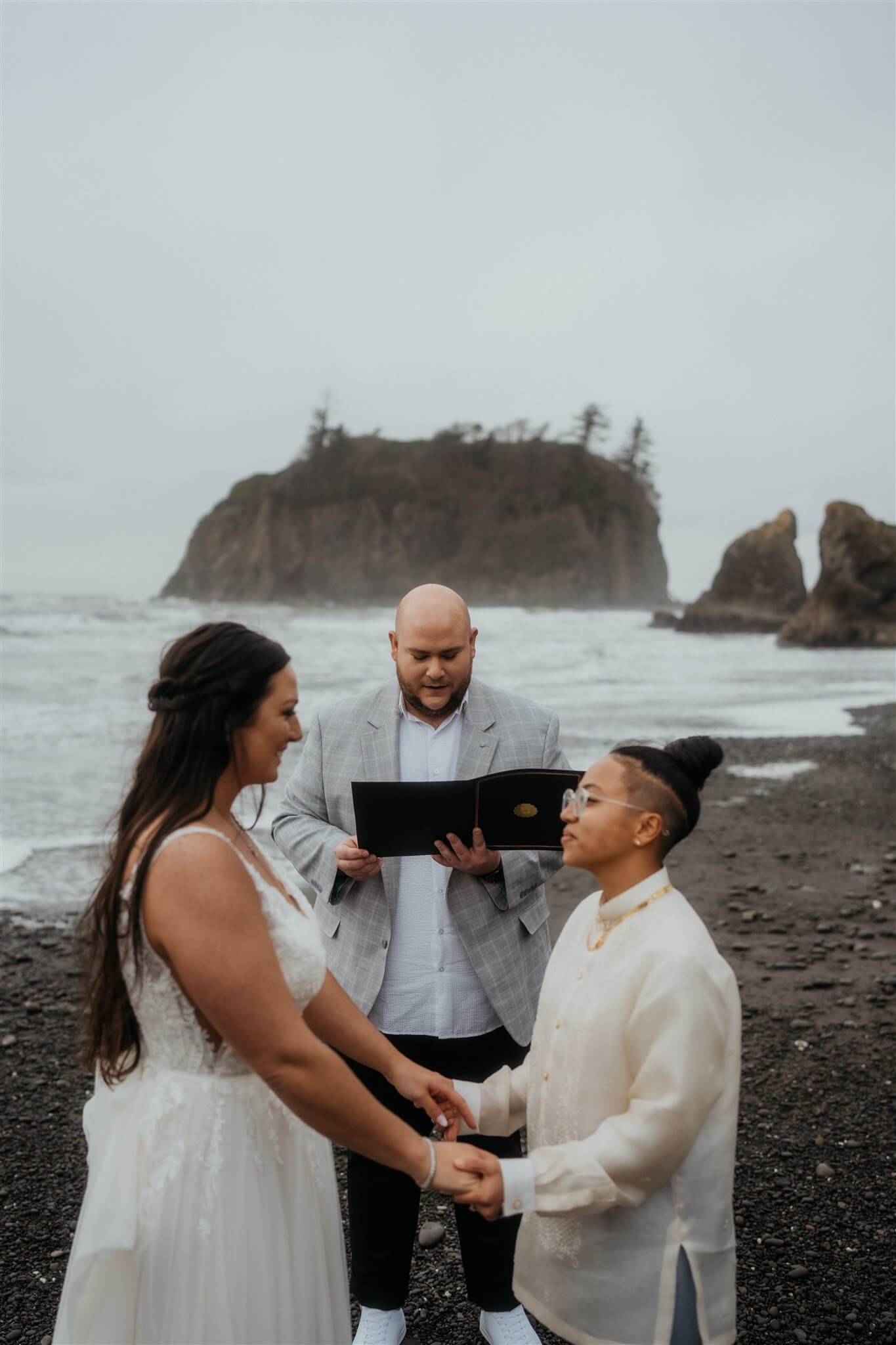 Elopement ceremony with two brides at Ruby Beach