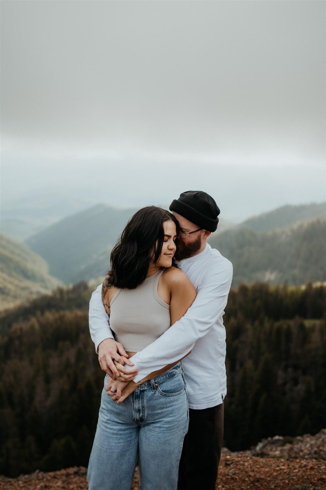 Couple hugging during photo session at Red Top Lookout