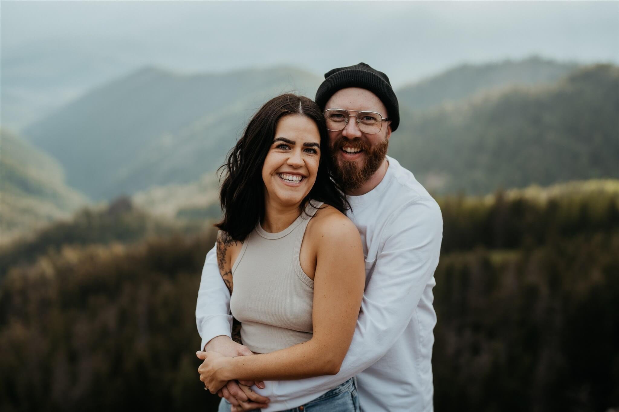 Couple hugging during anniversary session at Red Top Lookout