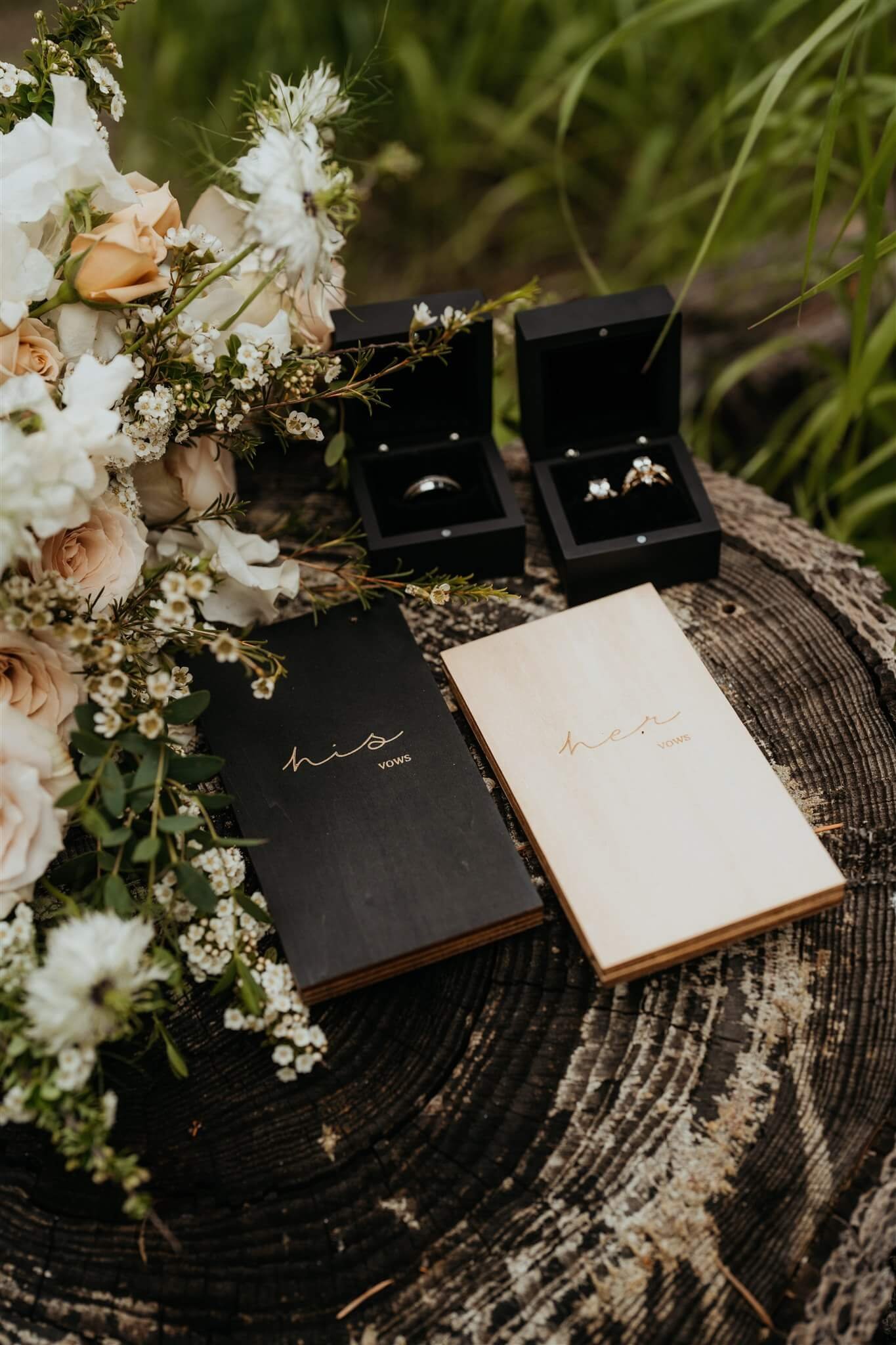 Black, cream, and white wedding details and vow books