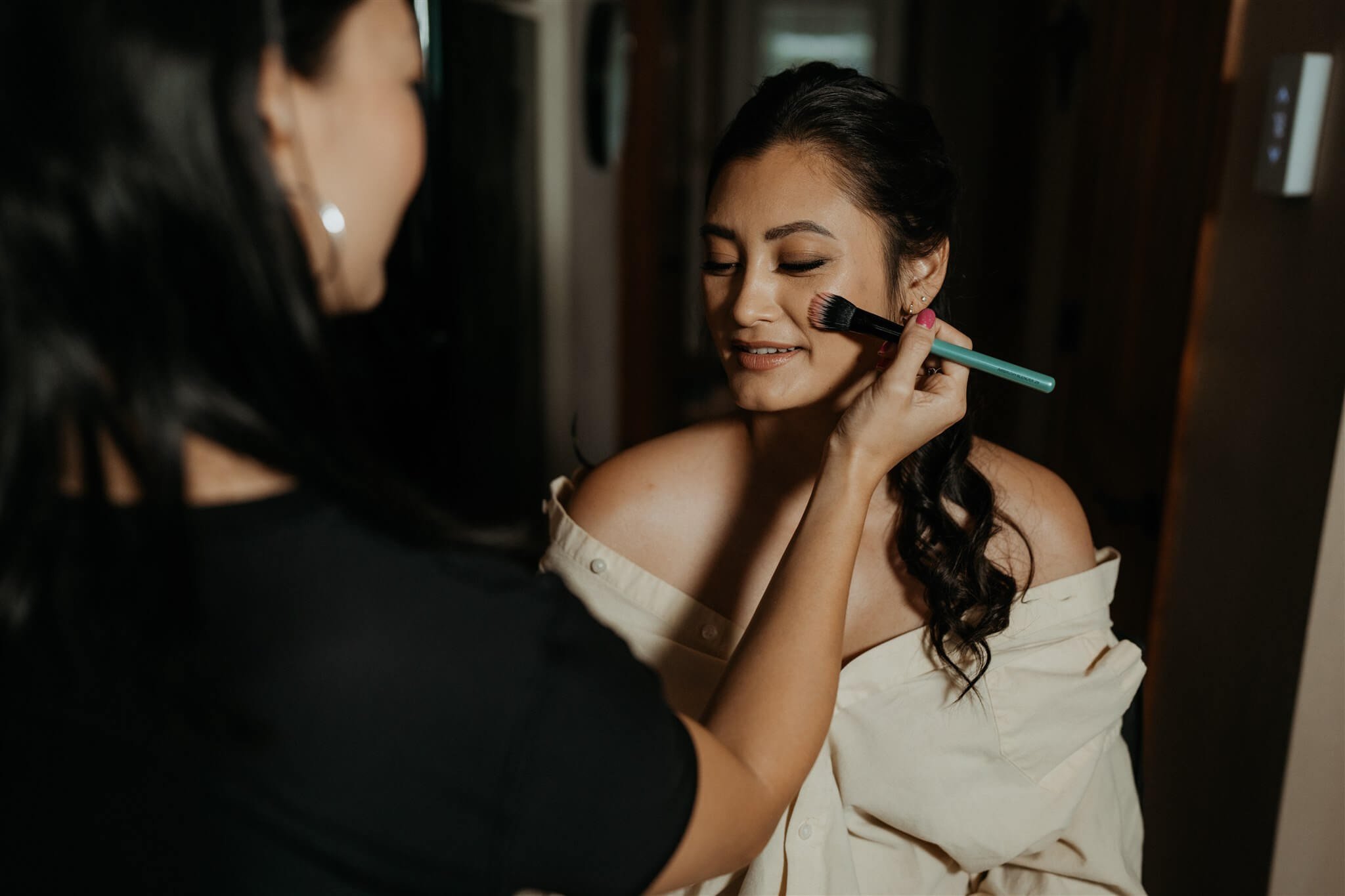 Bride getting makeup done for North Cascades elopement