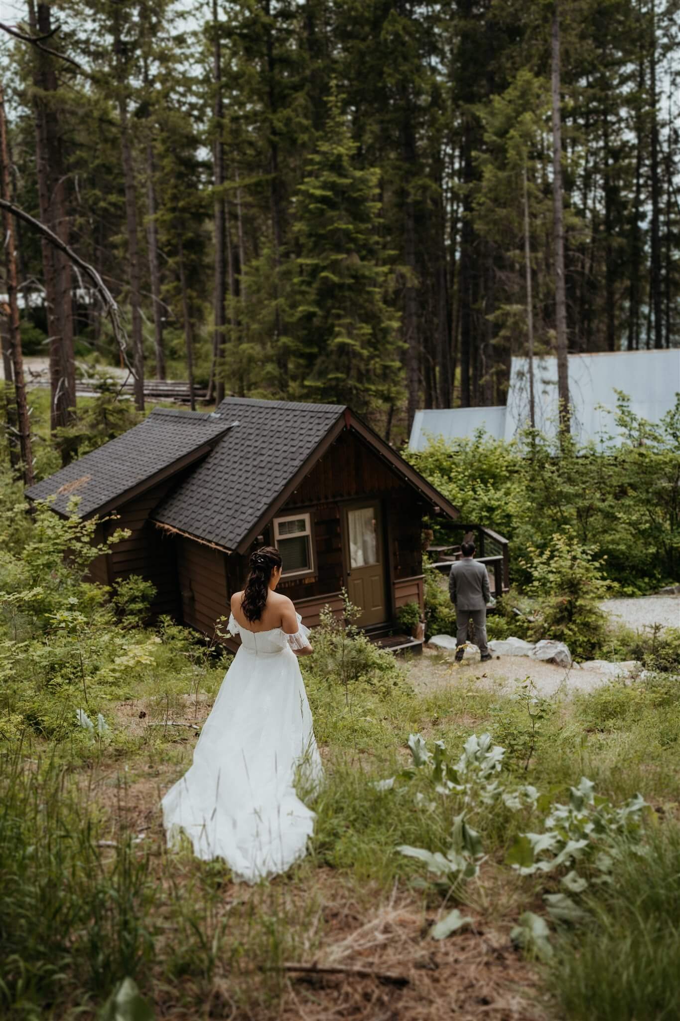 Bride walking to first look location in the North Cascades