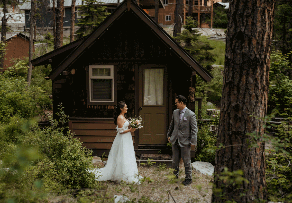 Bride and groom first look outside cabin in the North Cascades