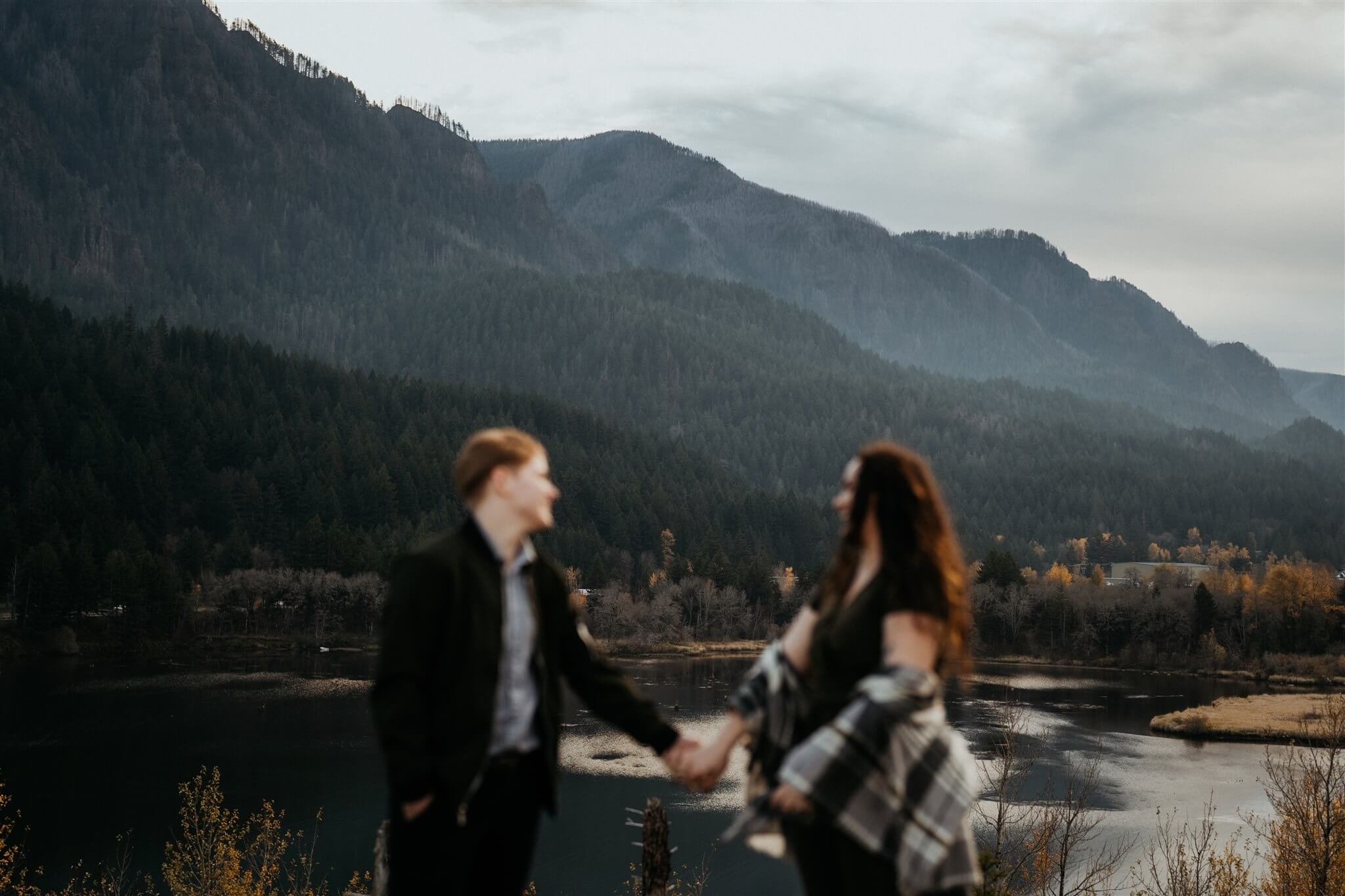 Couple portrait photos by the lake during Portland engagement photos