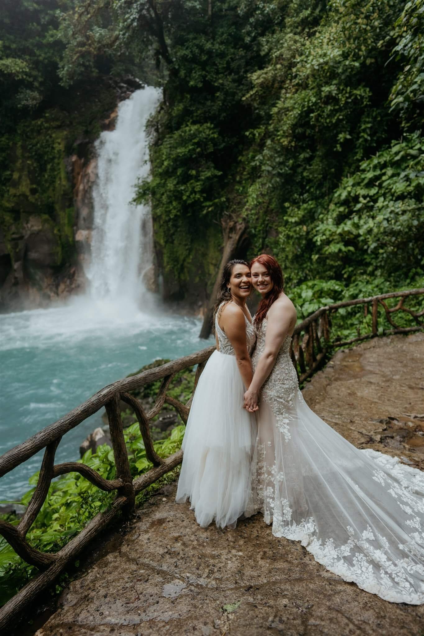 Wedding portraits next to a waterfall at Costa Rica elopement