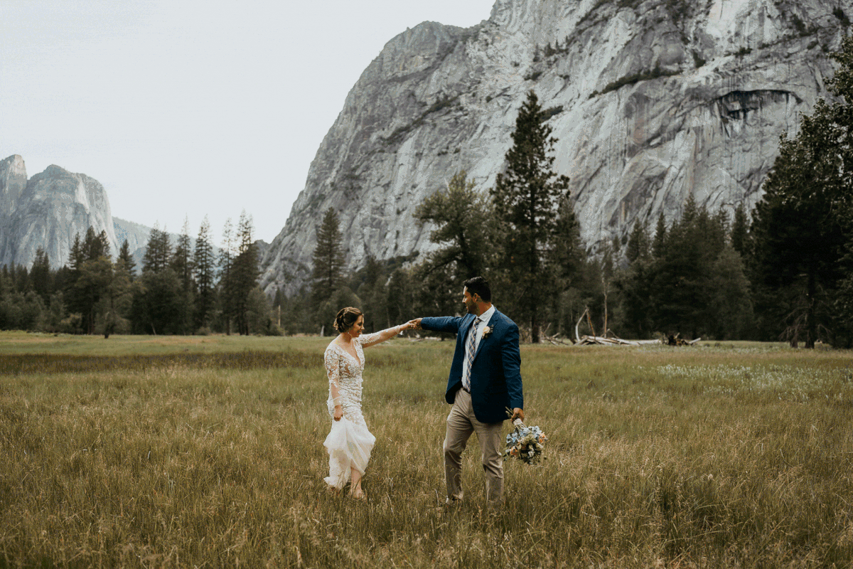 Bride and groom dance at the base of Half Dome during elopement in Yosemite