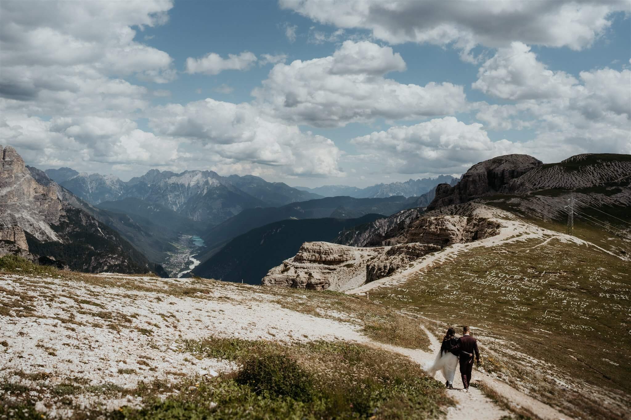 Bride and groom hiking the Dolomites Italy for their private vow renewal