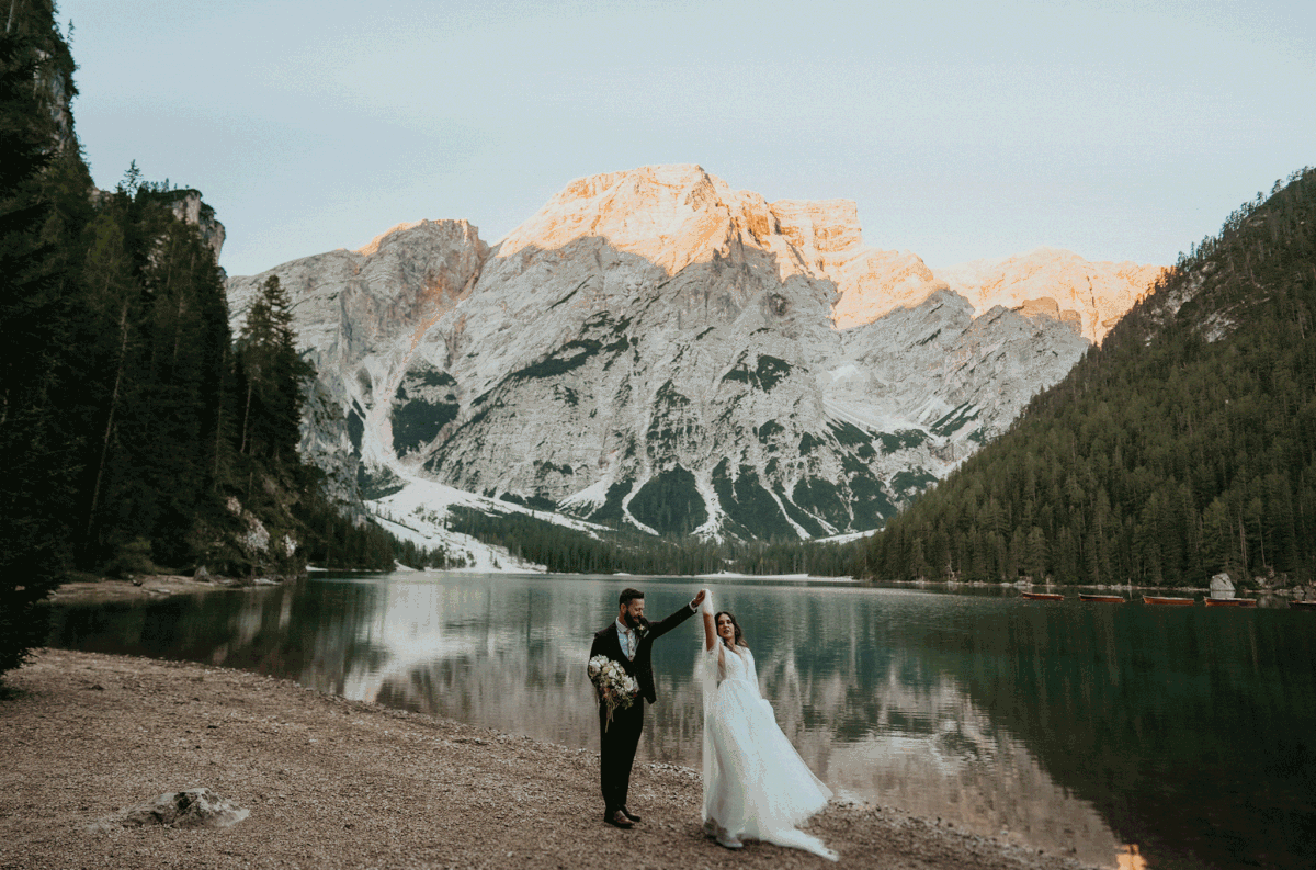 Bride and groom dance after first look at Lago di Braies