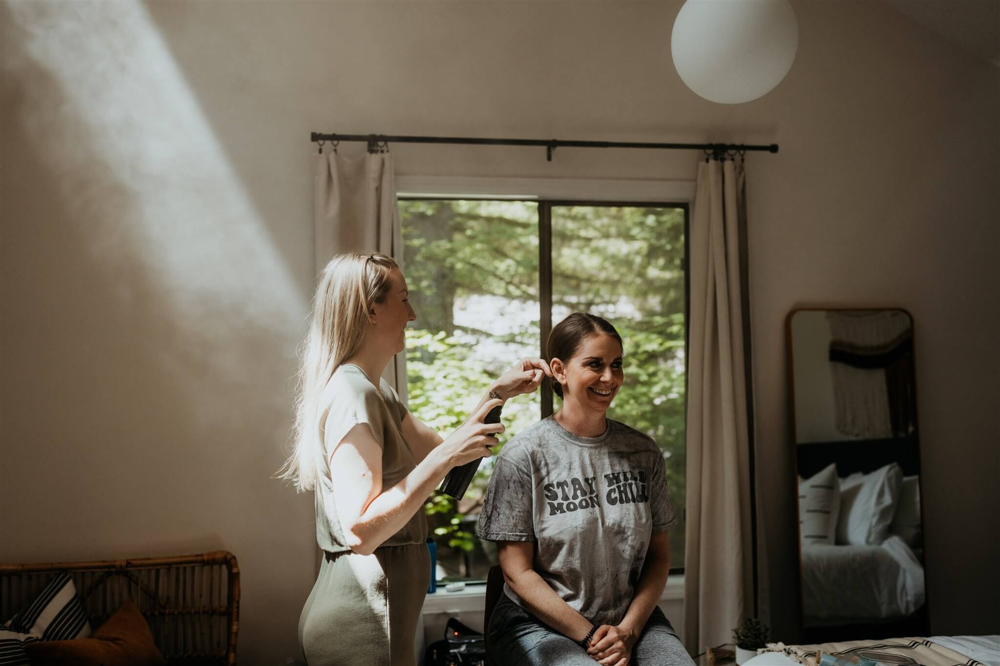 Bride getting hair and makeup done for waterfall elopement at Mt Hood