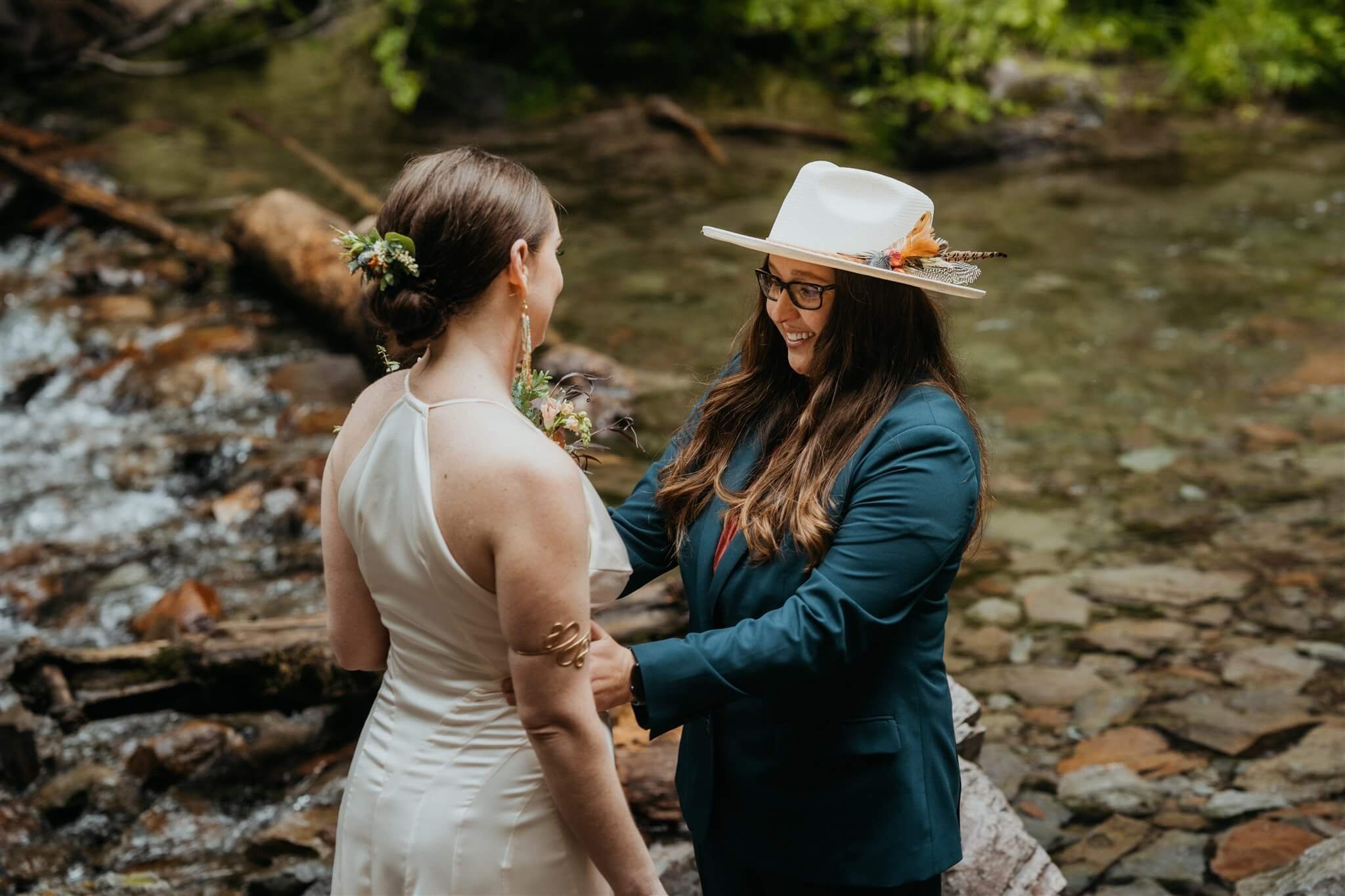 Two brides first look at waterfall elopement in Mt Hood, Oregon