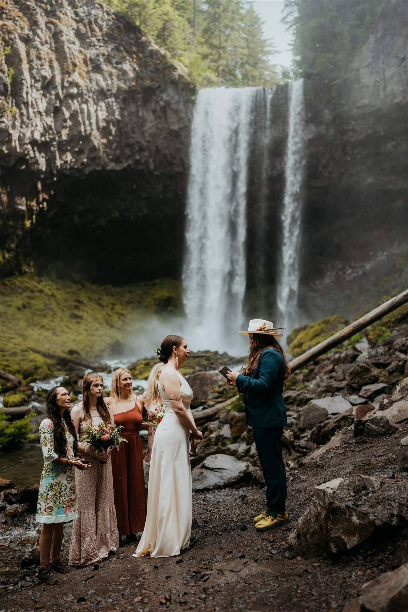 Mt Hood elopement ceremony in front of a waterfall