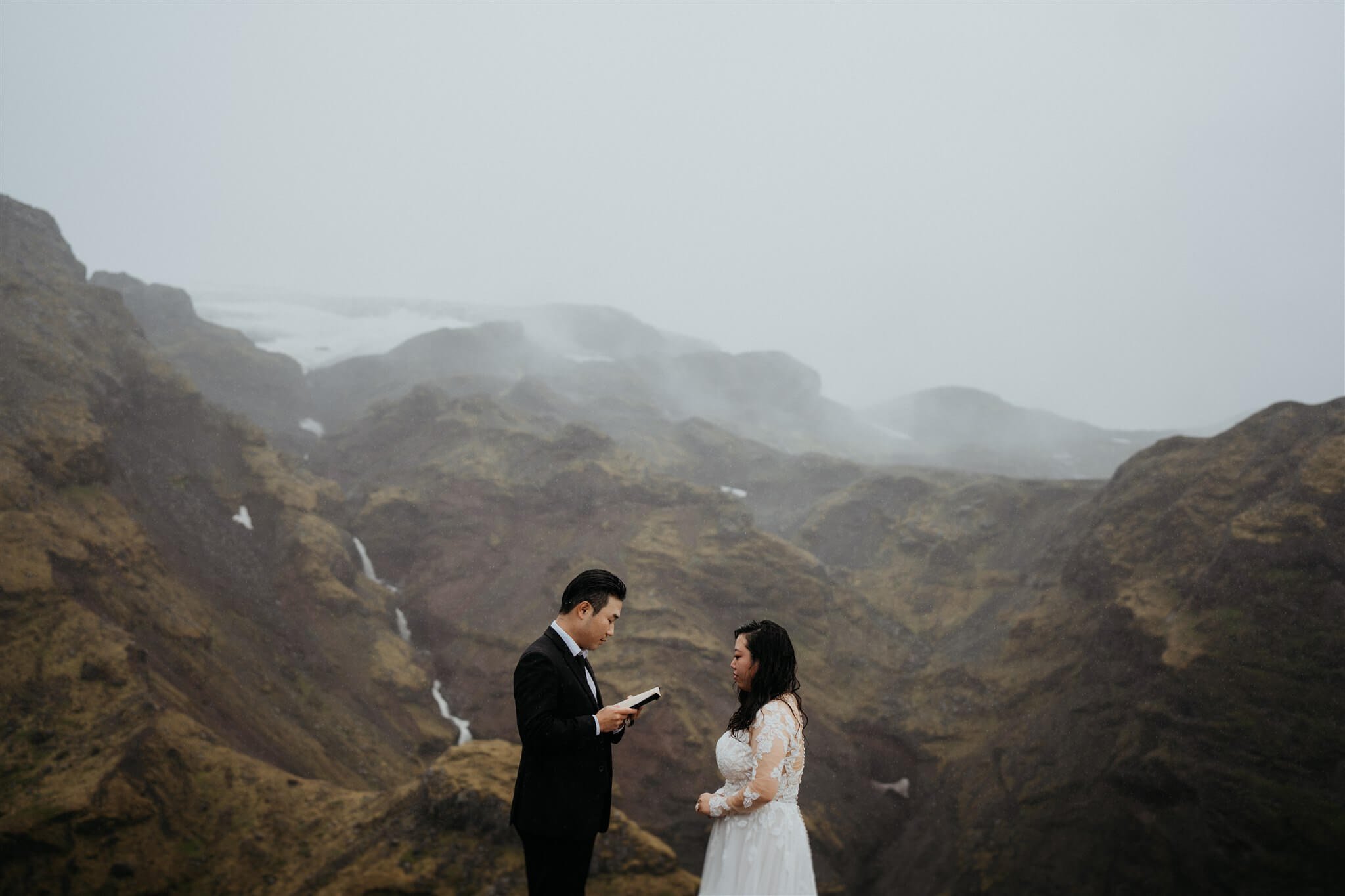 Bride and groom exchange vows during their elopement in Iceland