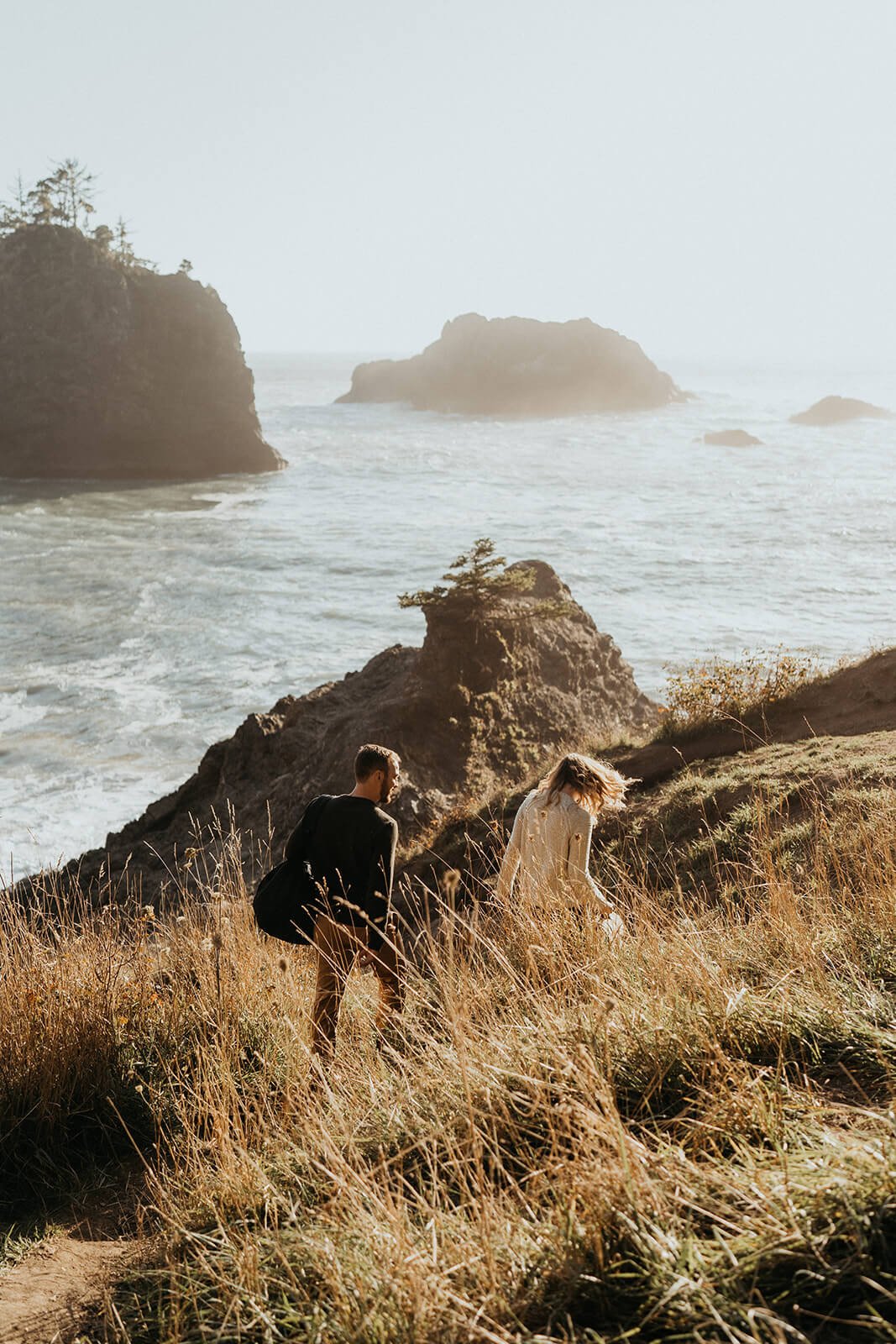 Couple hiking to location for couple photoshoot