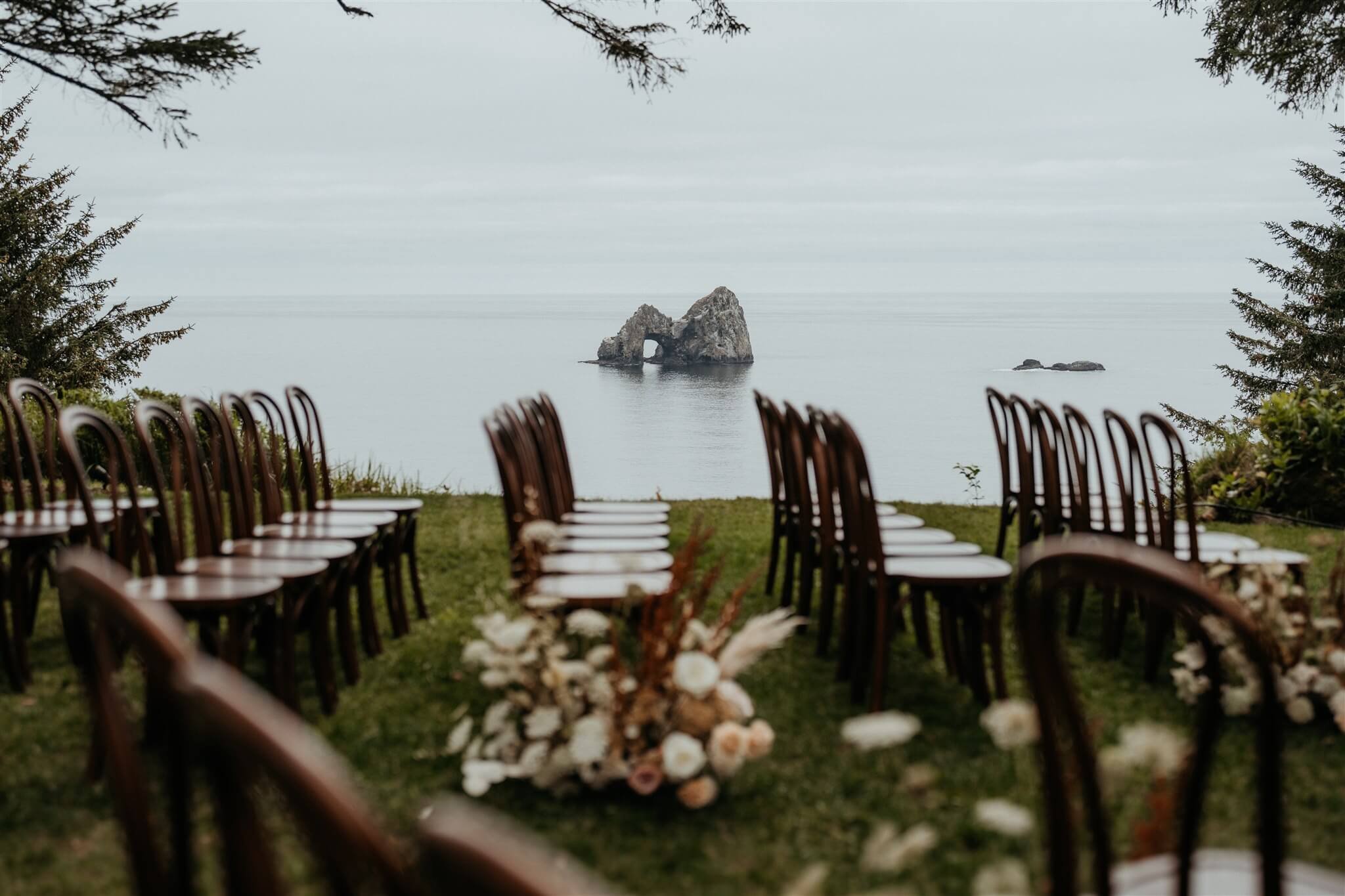Elegant wedding ceremony setup on the Oregon Coast