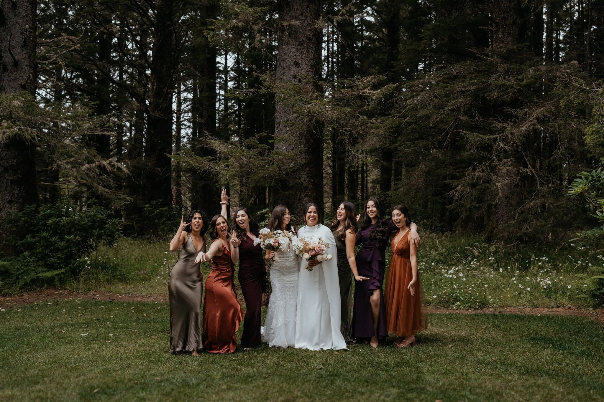 Bridal party portraits at flower-filled wedding