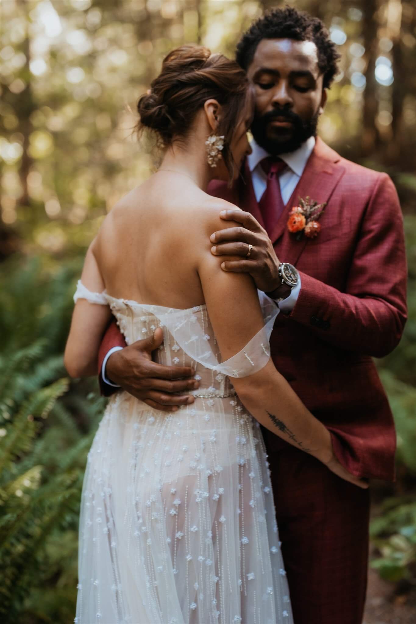 Bride and groom portraits in the forest at North Cascades National Park elopement