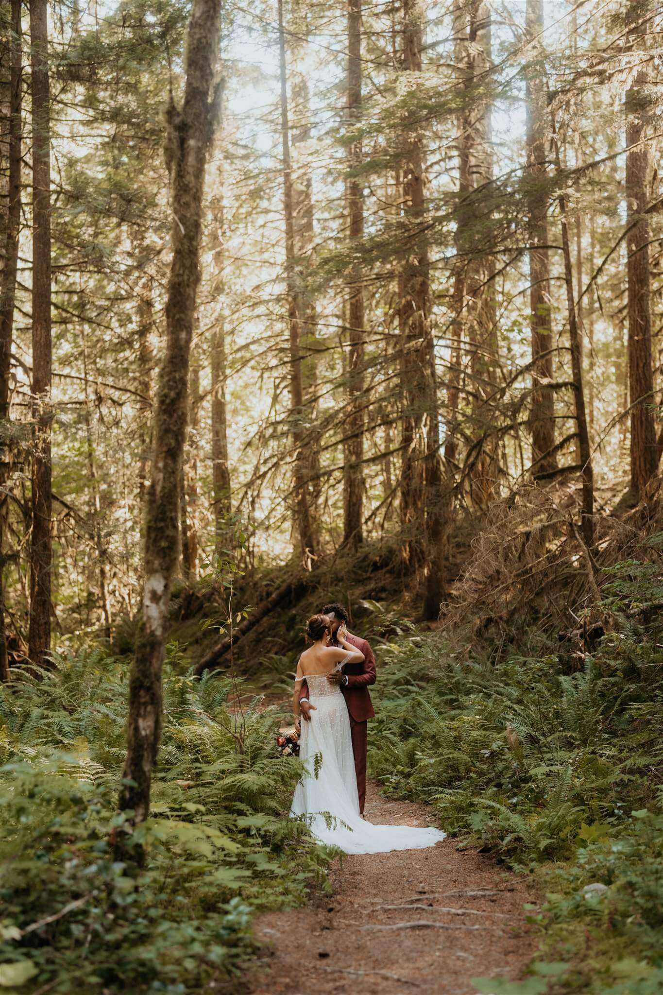 Bride and groom portraits in the forest at North Cascades National Park elopement