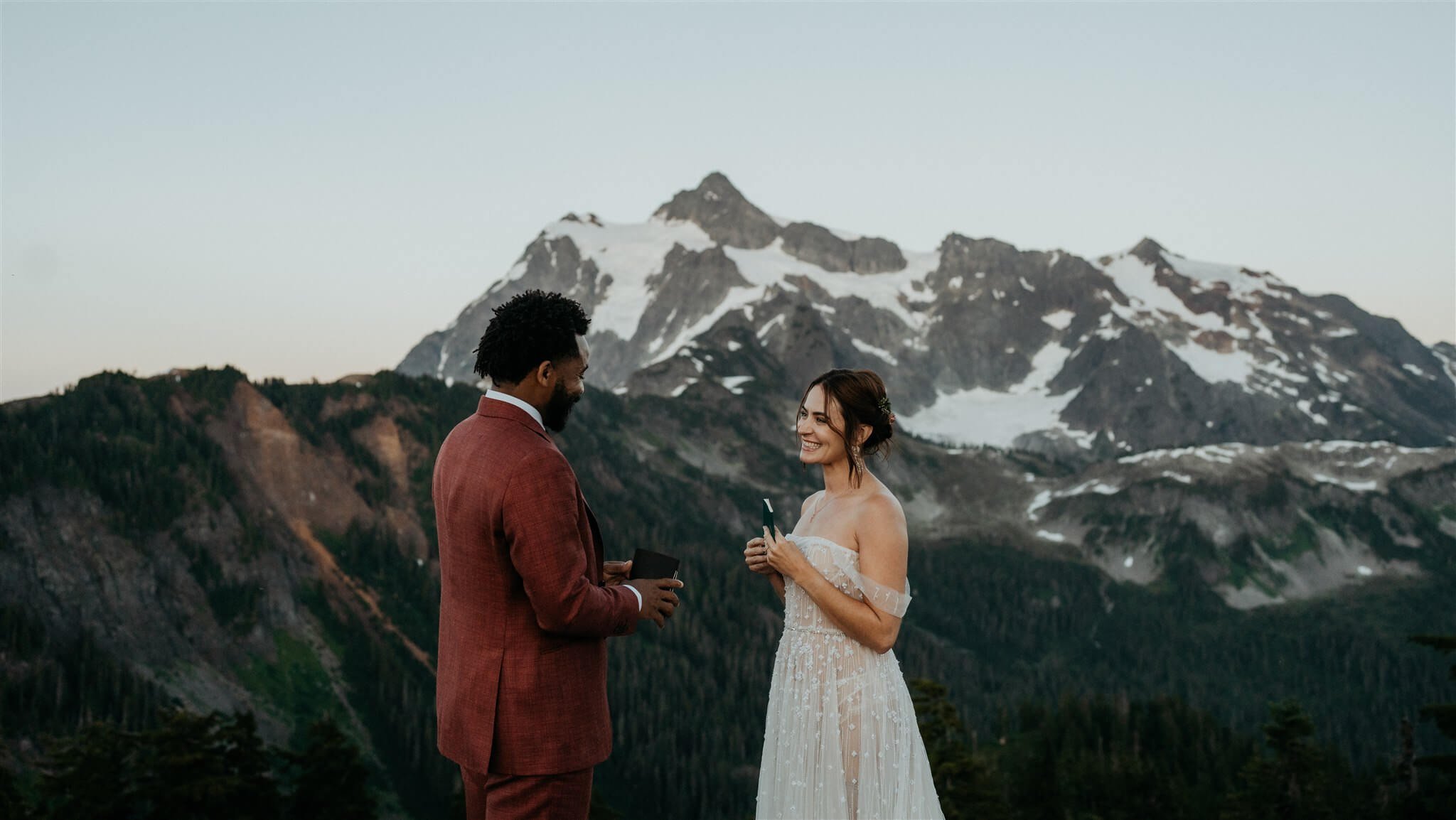 Bride and groom exchange vows in the mountains at North Cascades National Park elopement