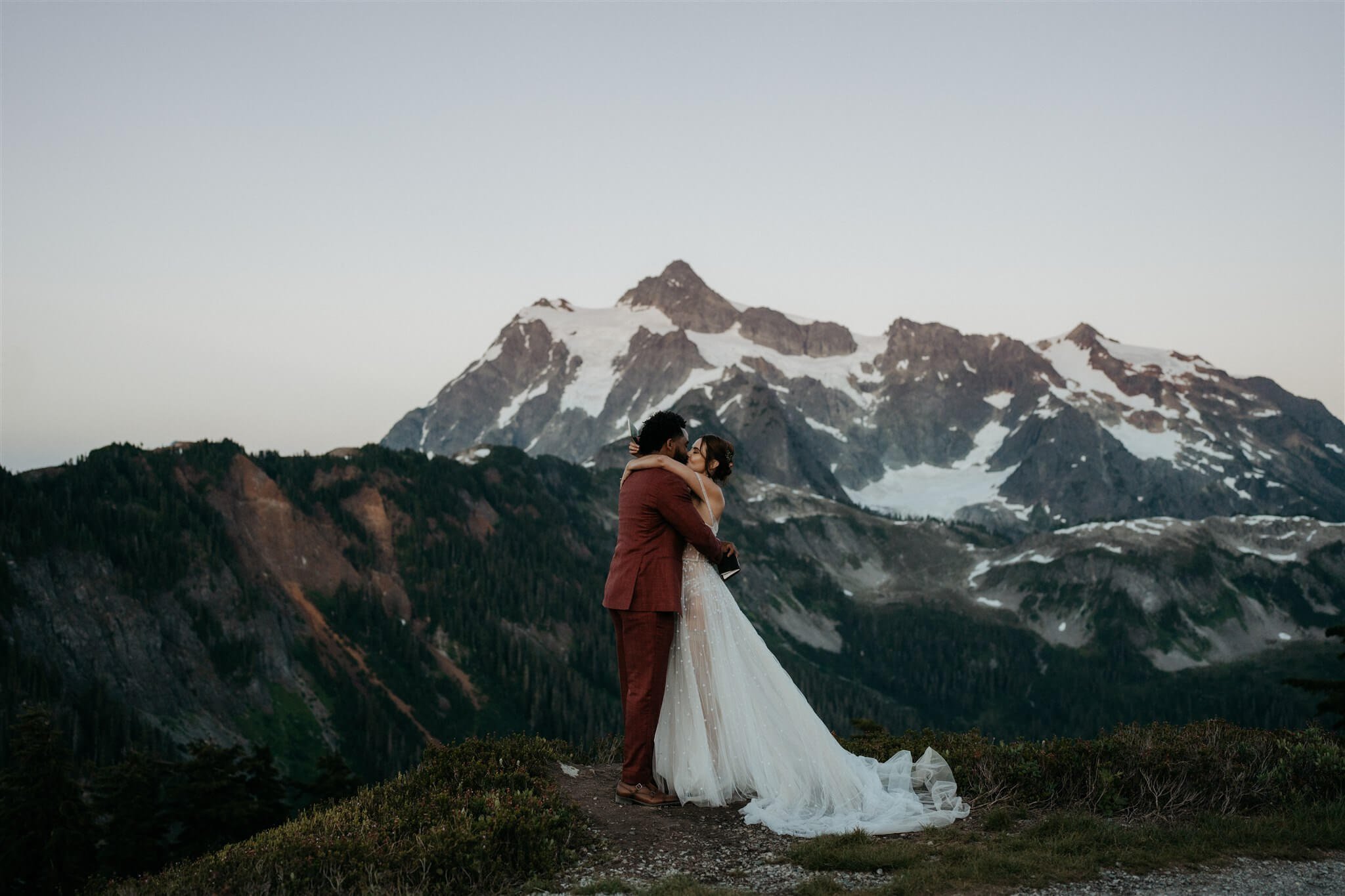 Bride and groom exchange vows in the mountains at North Cascades National Park elopement