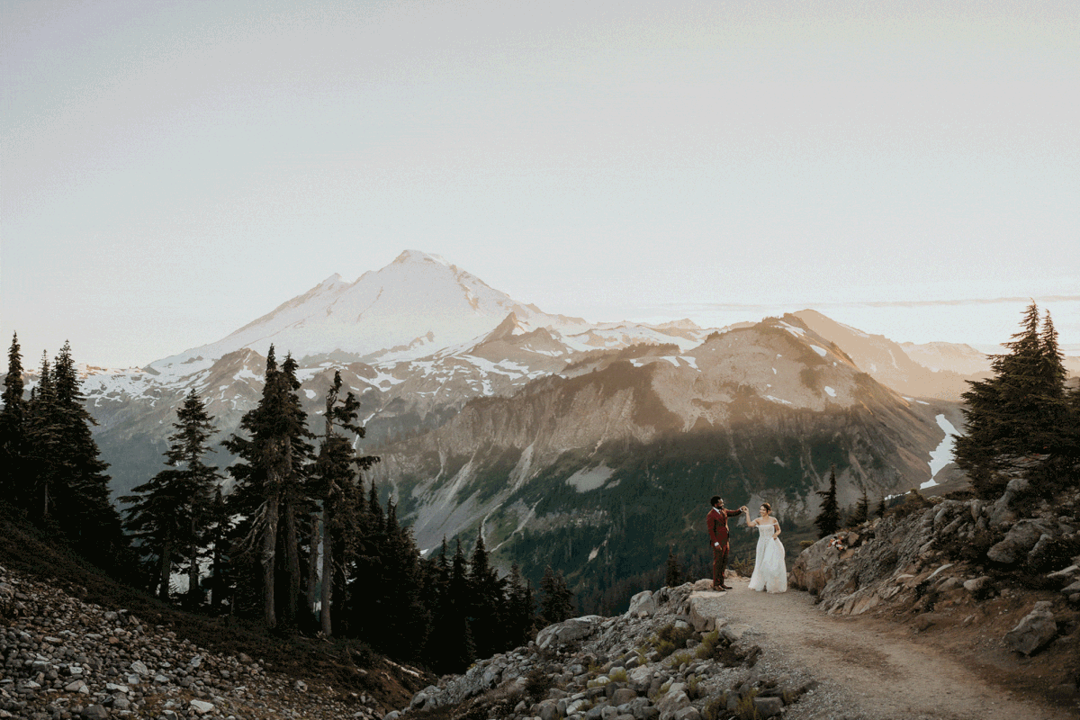 Bride and groom dance during portrait photos in North Cascades National Park
