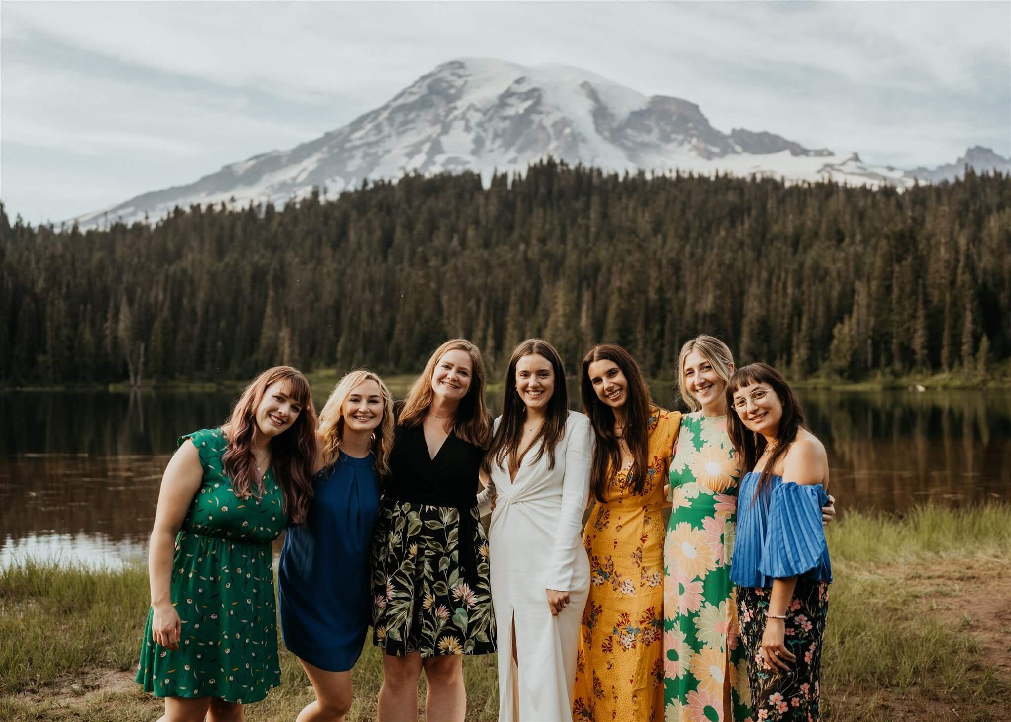 Bride with friends at Mt Rainier elopement