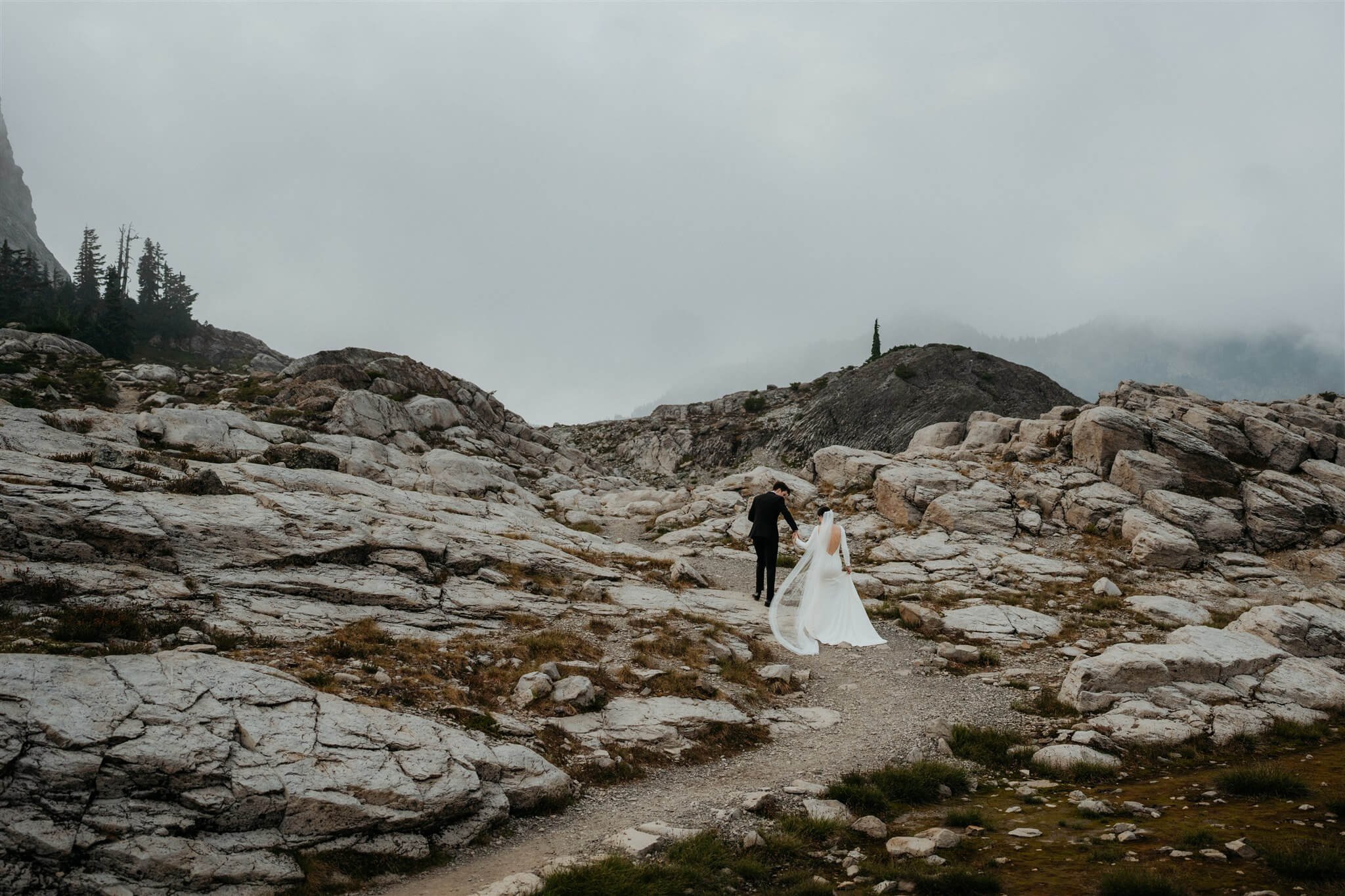 Bride and groom hike around Artist Point for elopement portraits in the North Cascades